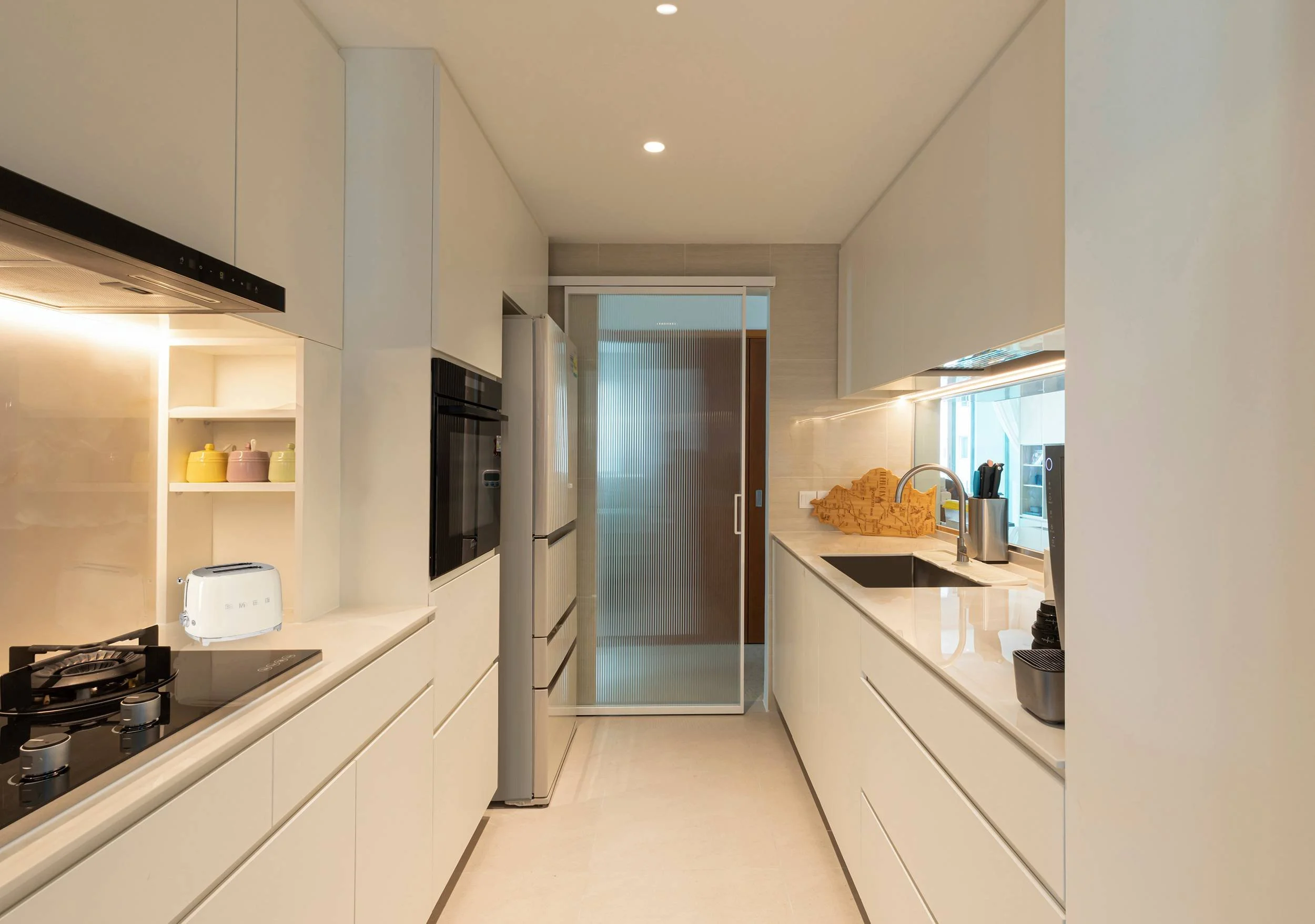 Modern European kitchen at Sunglade Condo Singapore featuring custom carpentry, functional layout, clean lines and premium material finishes