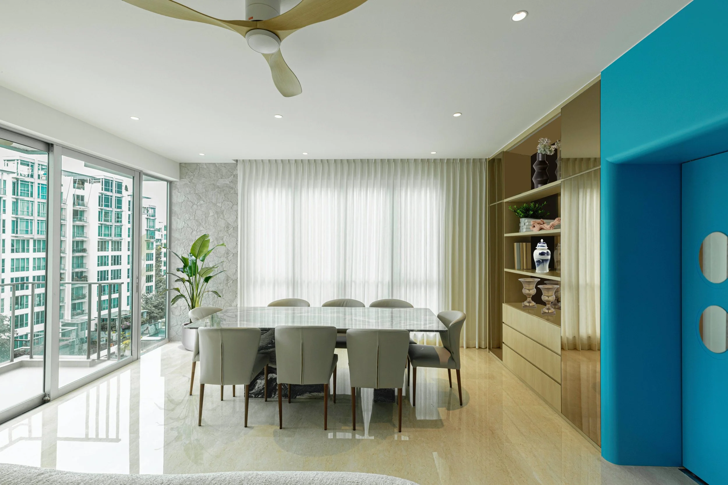 Coastal luxury living room at Caribbean Keppel Bay Singapore featuring sea view inspired interior design, soft neutral tones, elegant textures and refined detailing by Sketchworkdesignstyle