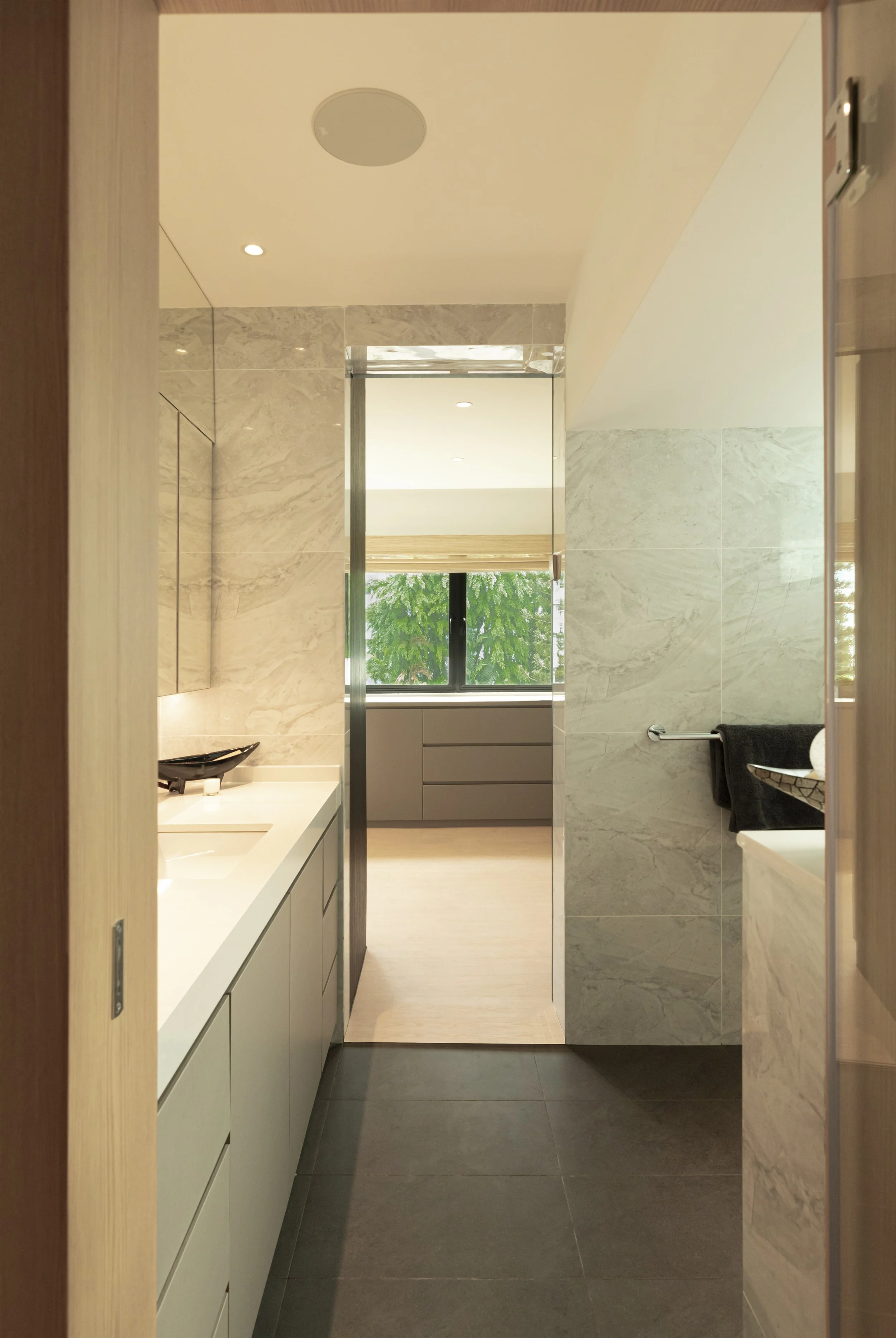 Japanese spa-inspired bathroom at The Lagoon Condo Katong Singapore with natural materials, clean lines and luxury hotel-style design