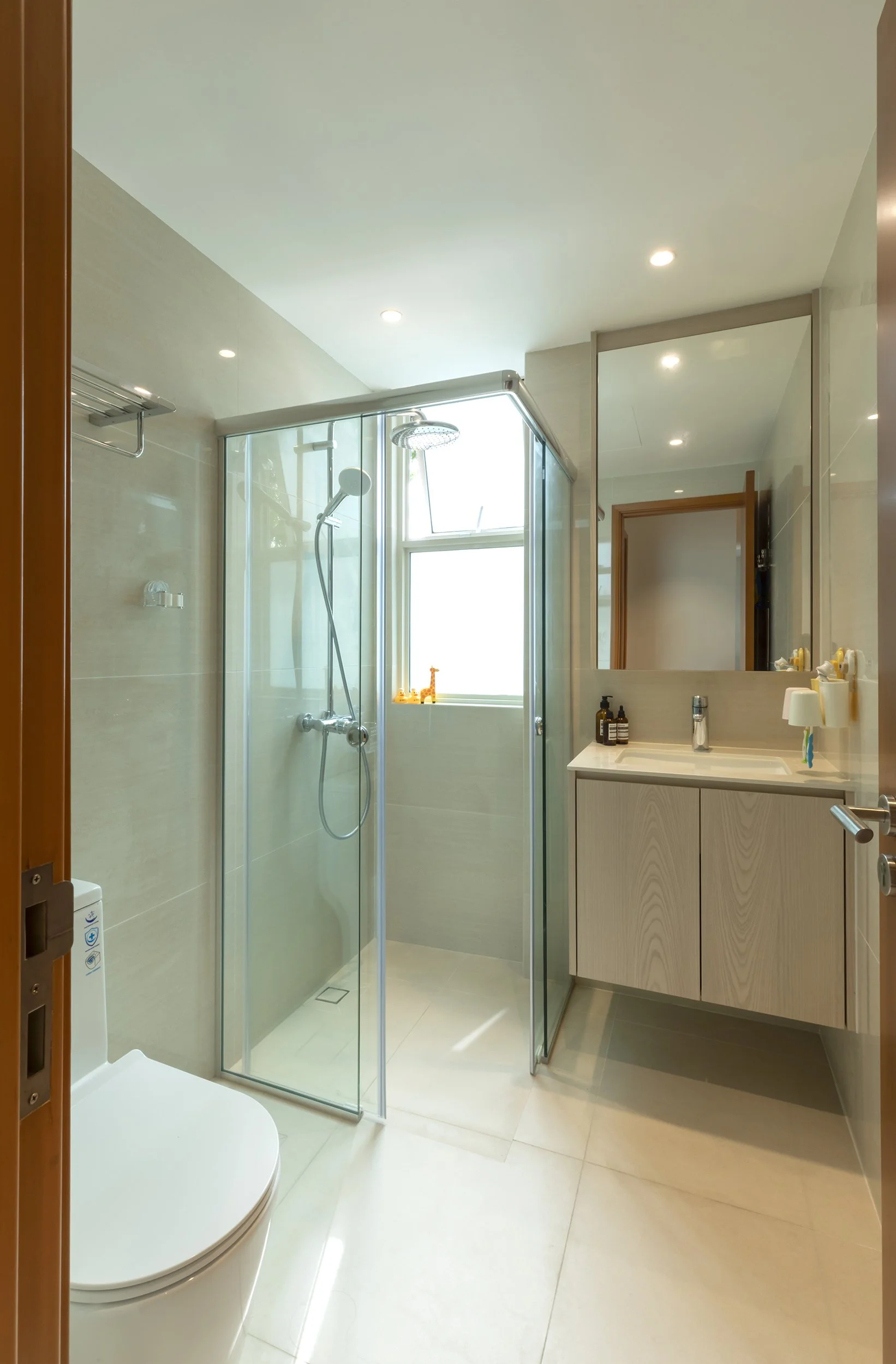 High-end bathroom interior at Sunglade Condo Singapore with marble detailing, clean layout, premium fittings and sophisticated modern European styling