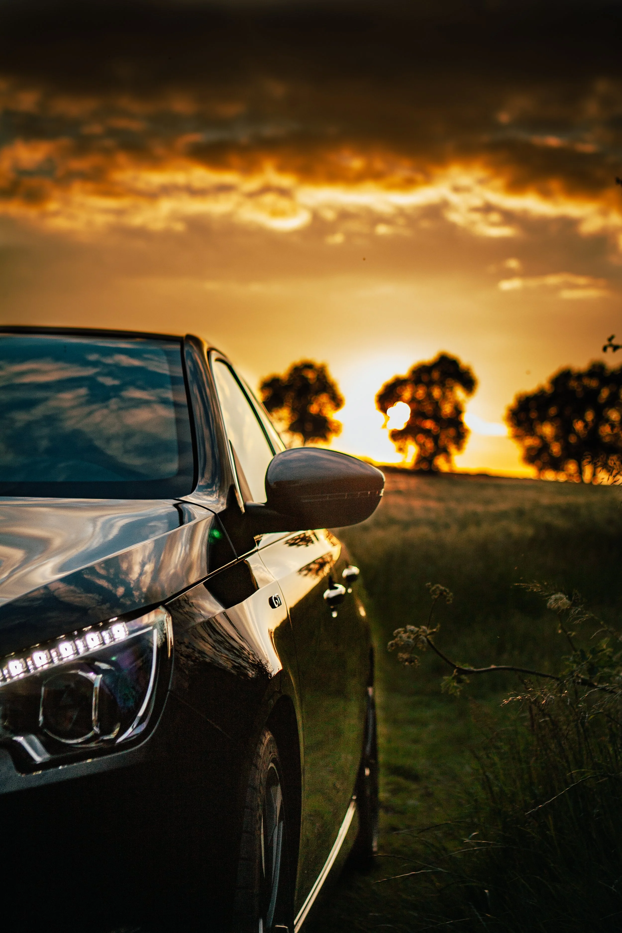 Peugeot 308 GTi schwarz sonnenuntergang Seite