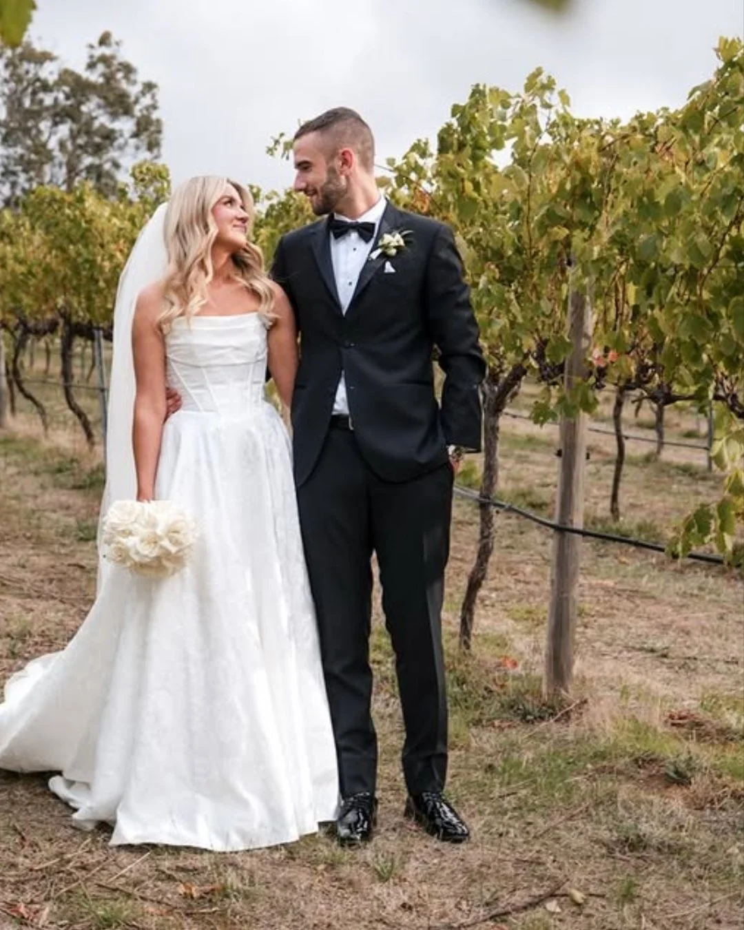 Chloe + Joel. We're speechless 🤍

Captured so beautifully by @aaron.knight.ak 〰️

What a season it's been...
Every couple. Every vow. Every teary dad speech and every slow dance under the fairy lights. Every walk down the aisle, every "what a b