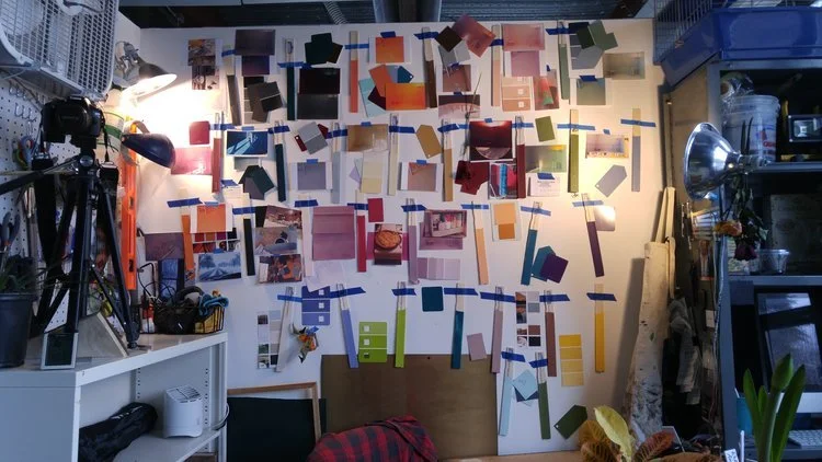 paint swatches and stir sticks