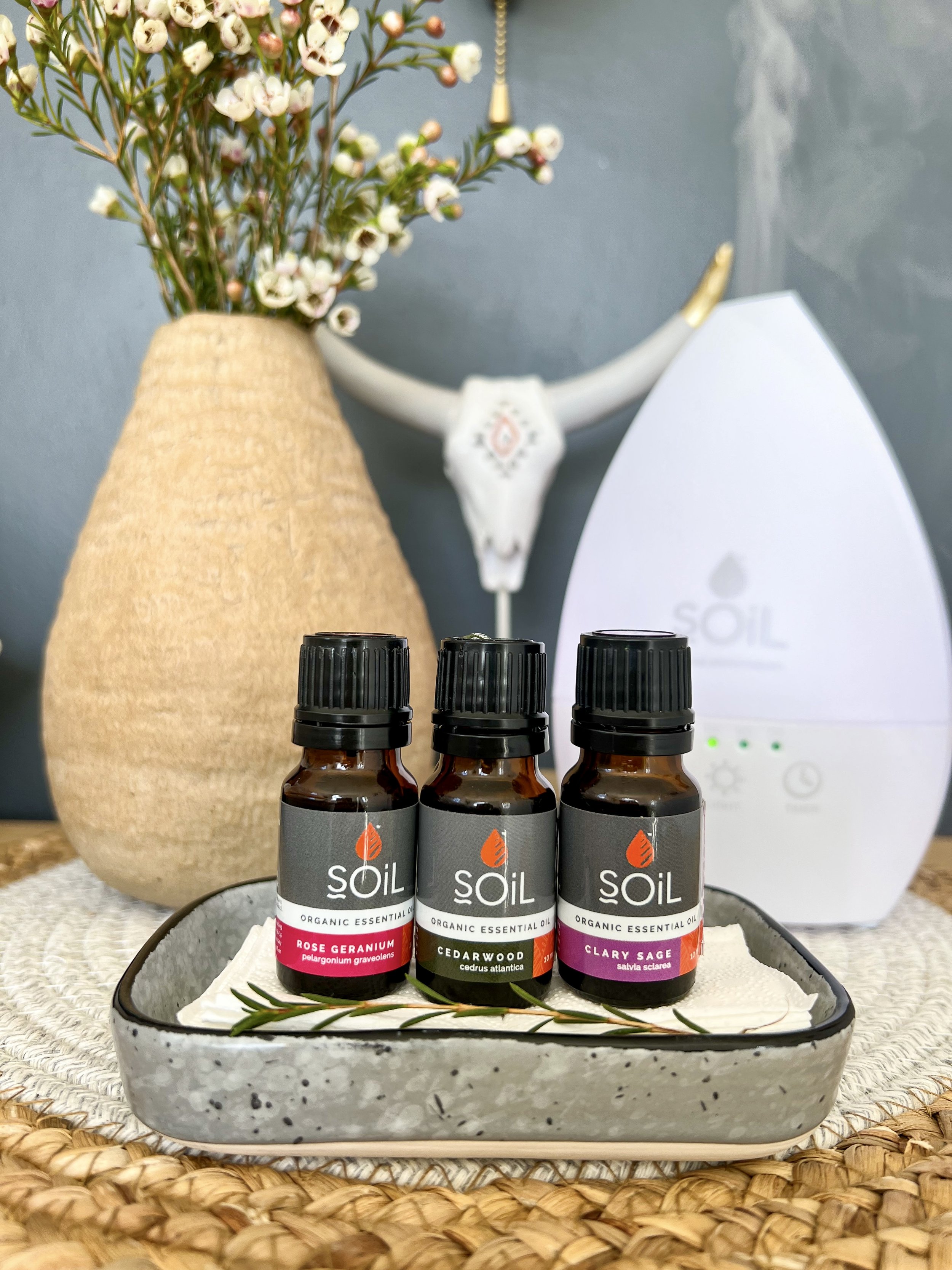 Rose Geranium, Cedarwood, Clary Sage Oils.jpeg
