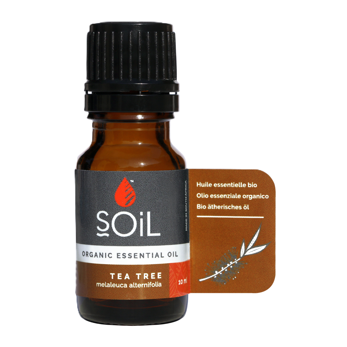 A small amber glass bottle of SOiL Organic Essential Oil labelled 'Tea Tree' with a black cap and a brown attached tag indicating it contains 10 ml of tea tree oil.