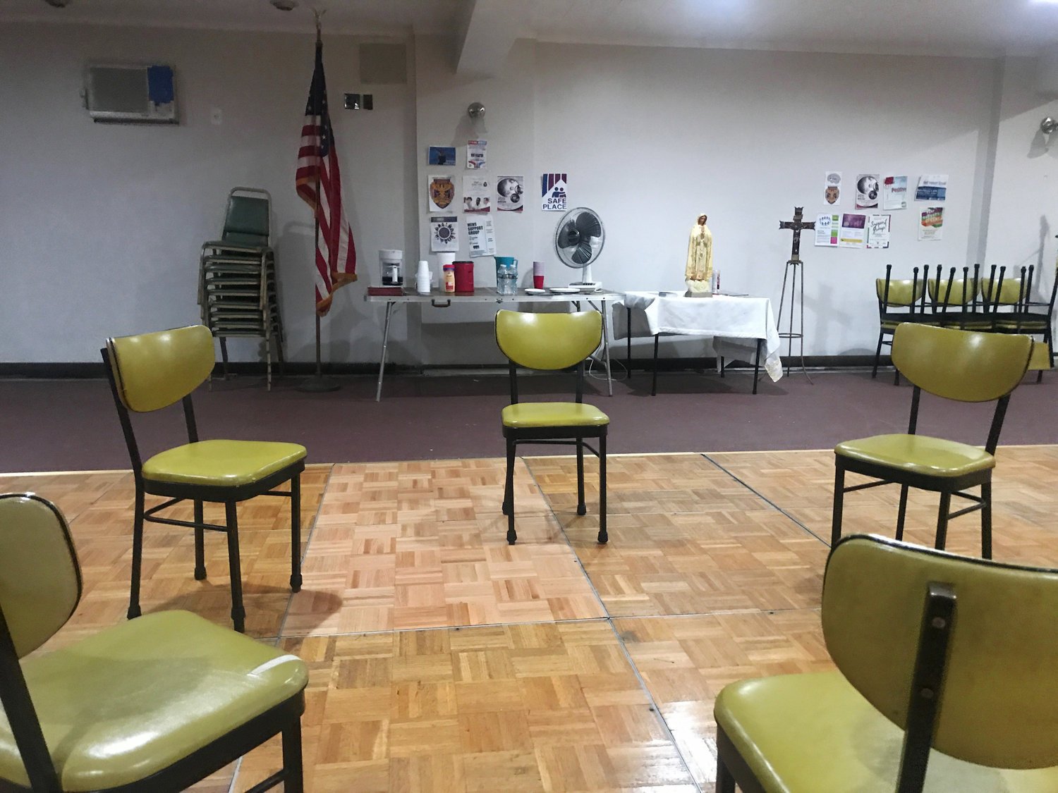 Creating the feel of a church basement was the perfect opportunity to combine the crucial elements that governed the past life of the male lead character: Faith and Country. It was equally important to connect that space to the past with use vintage