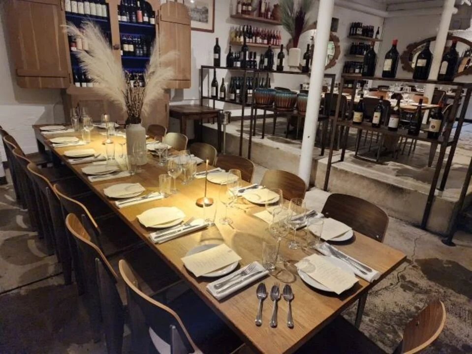 Private dining, group dining, large parties, events, buyouts, passed appetizers, cocktail reception - photo of main dining room that shows the bar as well. 