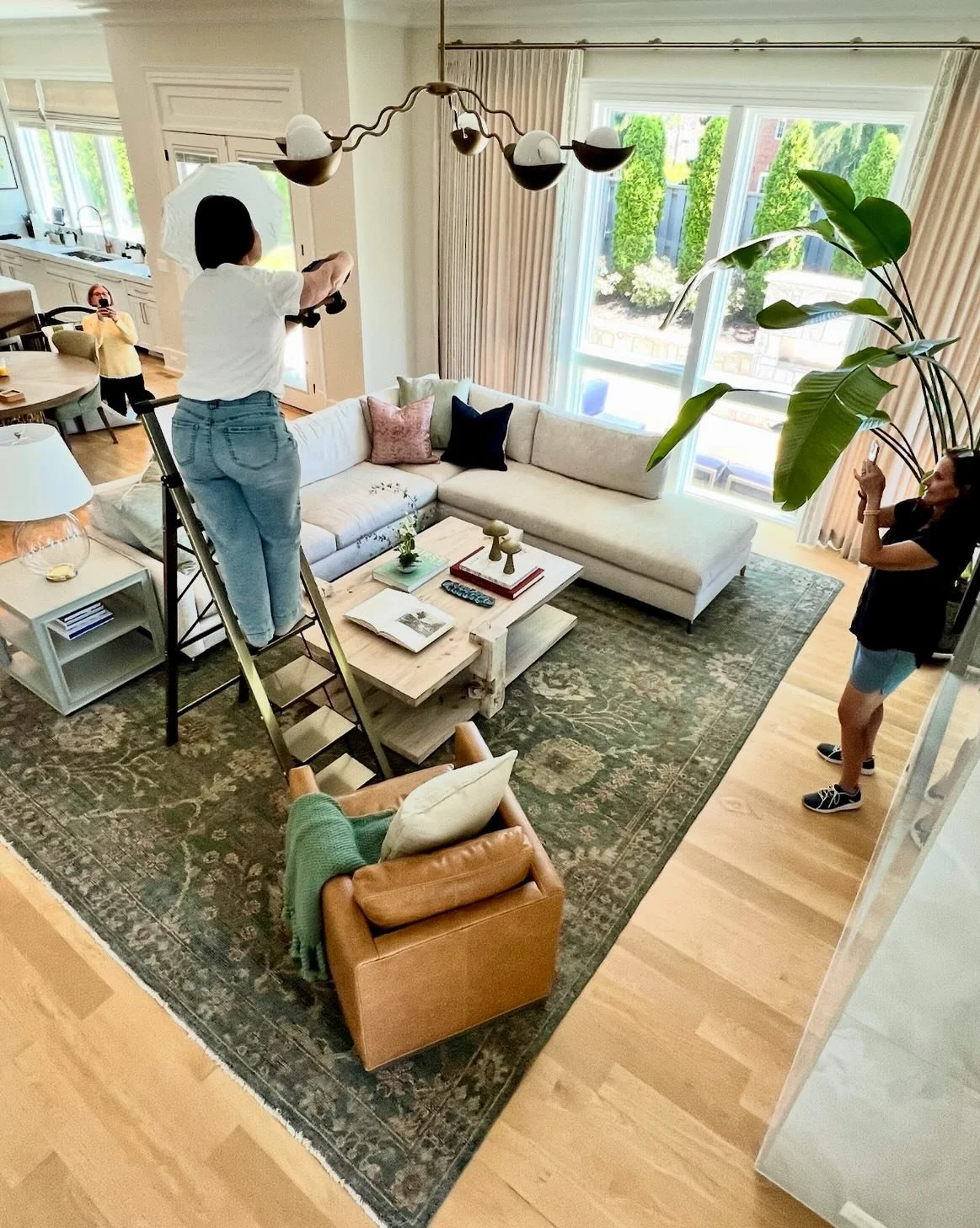 Behind every pretty picture is a ladder, a phone full of angles, moving plants around 47 times, and a team making the magic happen ✨📸