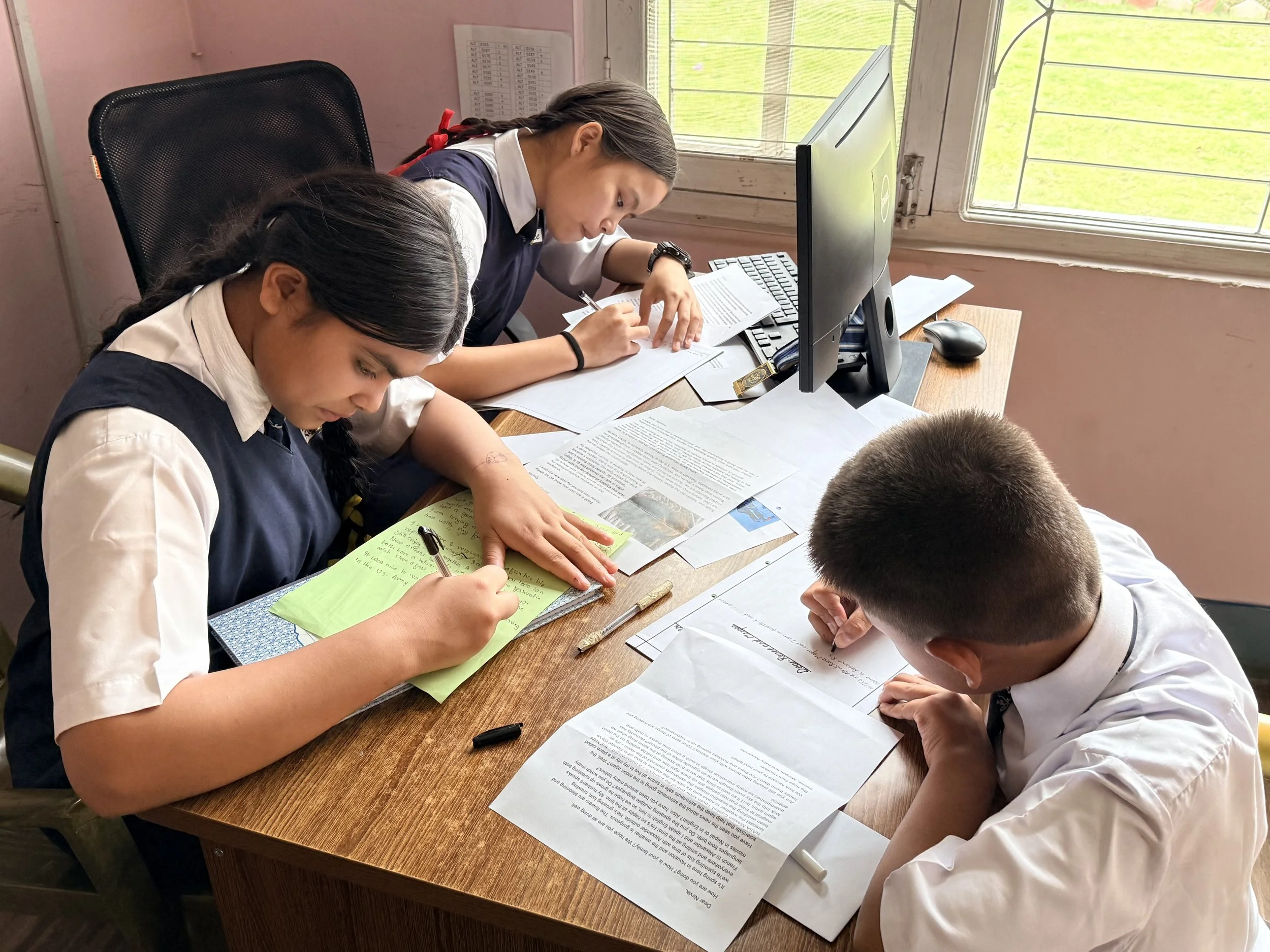 Letter writing at BSF Home Office.jpeg