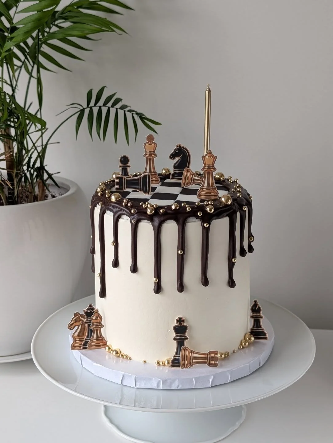 Elegant chess themed cake with a handmade fondant chessboard and dark chocolate drip. Loved how this one turned out ❤️
.
.
#chesscake #veganfood #chocolatedripcake #birthdaycake #uniquecakes