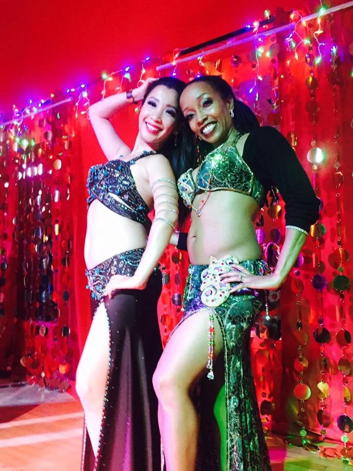 Asali Naimah and Tomi pose after show