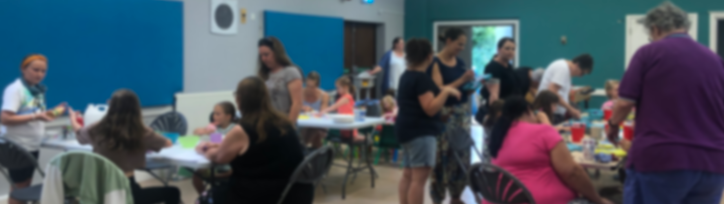 People enjoying craft activities at West Bicester Community Centre.