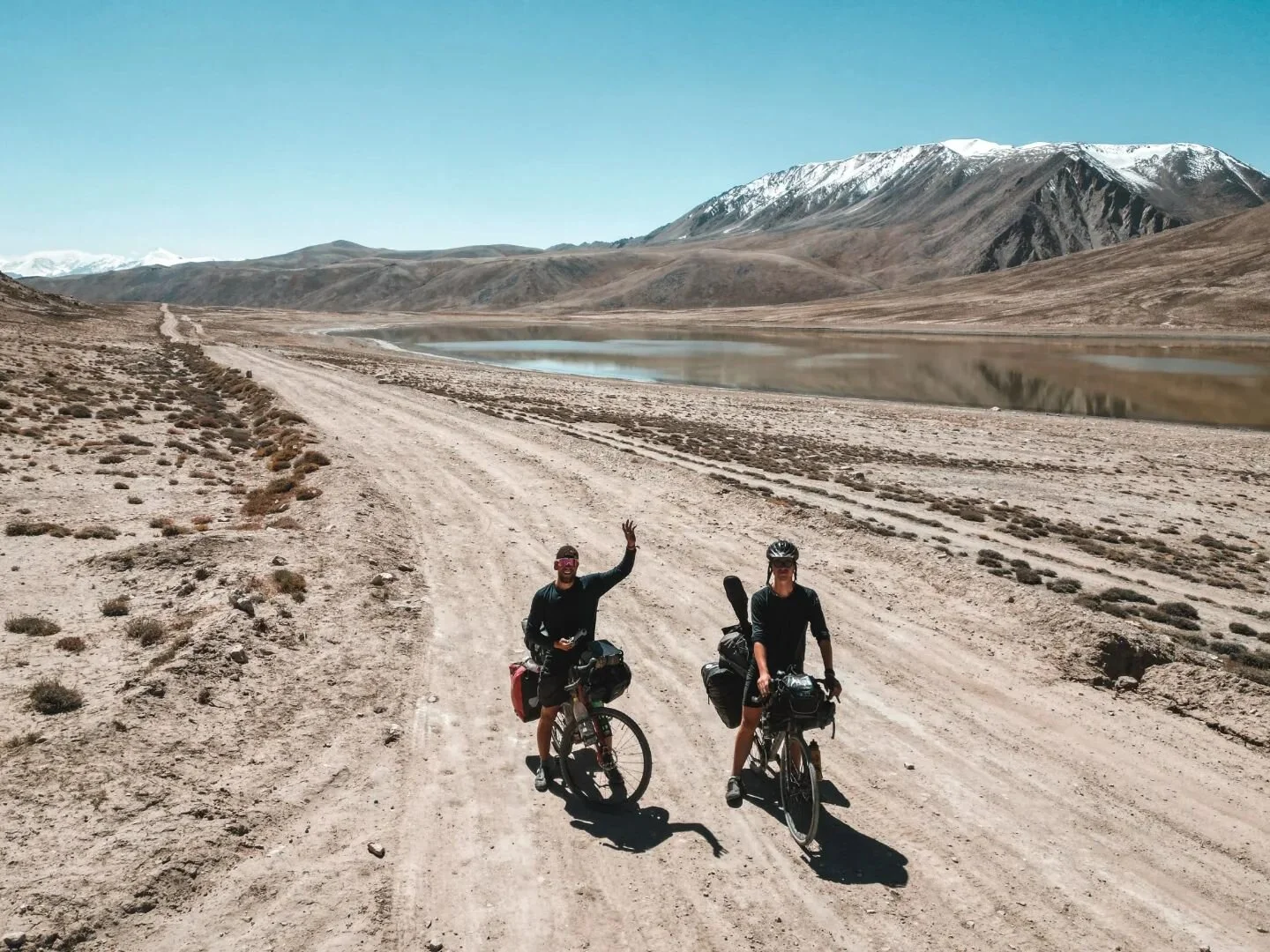 DAY 69
Alvis is at 50%, he needs to take a breather every 500m or so and is absolutely pooped at breakfast. We cycle into the furious gorge, with unbelievable mountains to each side. Hues of red, grey and black color the 500 meter high slabs. The roa
