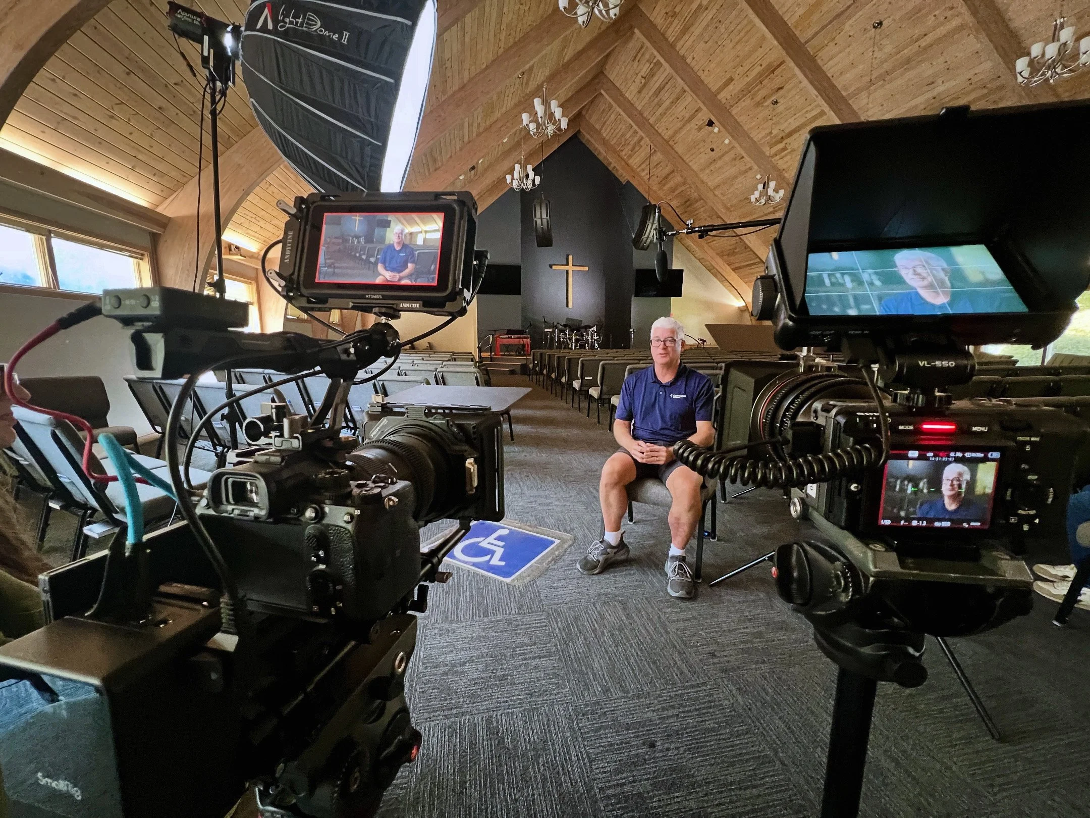 Motion Videography professional video production team filming on location in New England