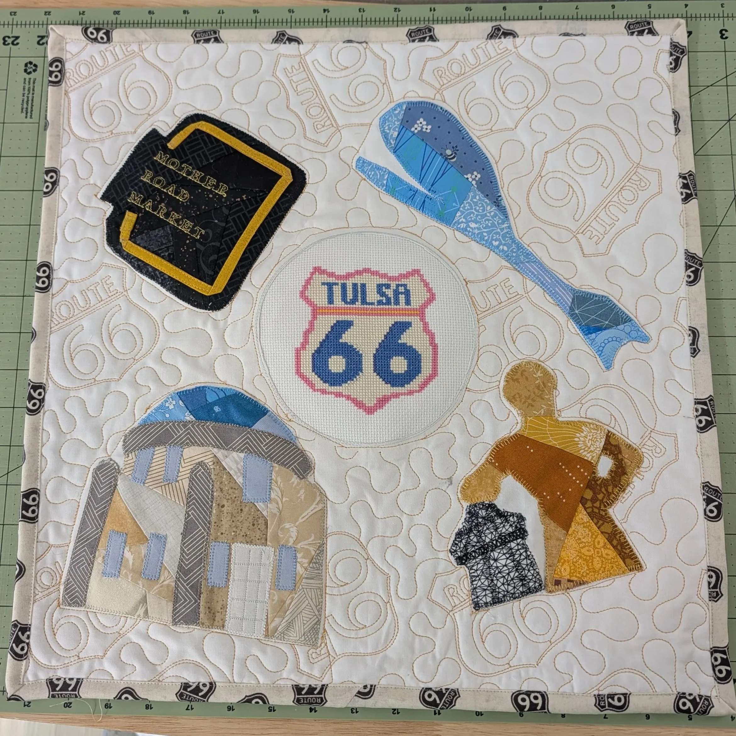 Route 66 Icons 
by Robyn Brown
*
Looked up icons that represented Tulsa, but ones I could use improv quilting with.