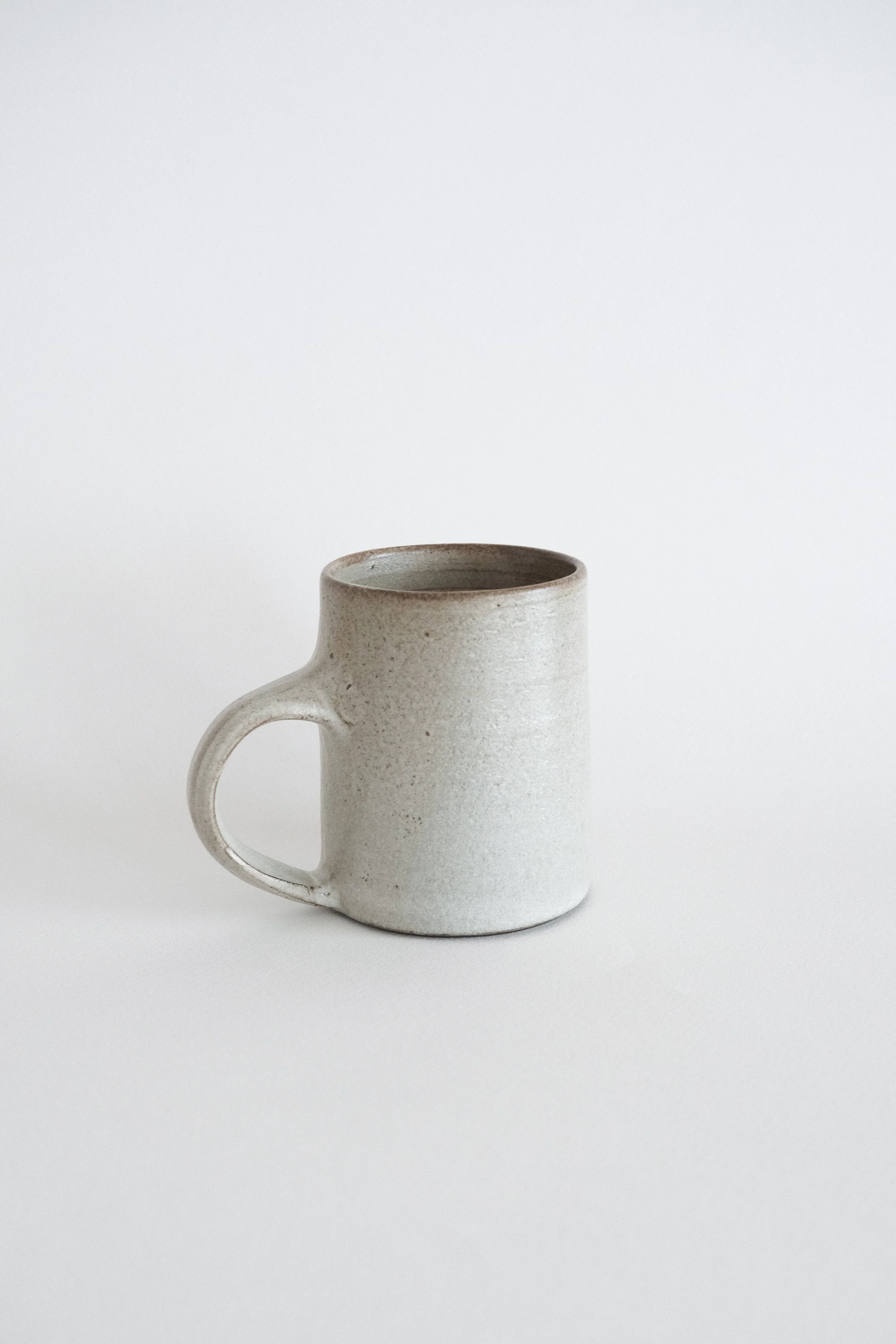 white tall mug