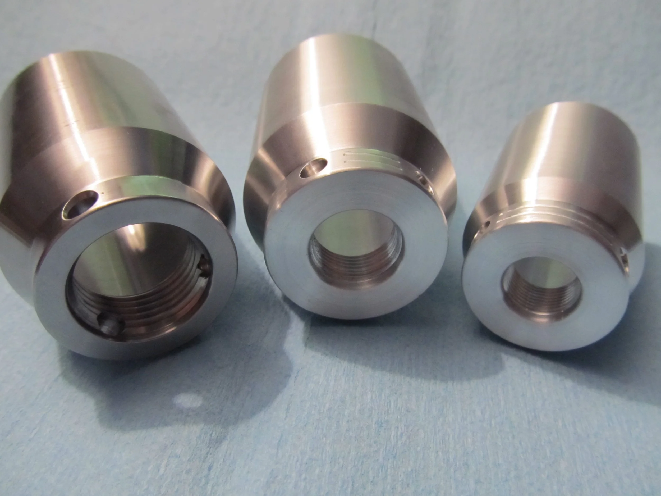 Different threading options: (L) Custom 7/8" (C) 5/8" (R) 1/2 