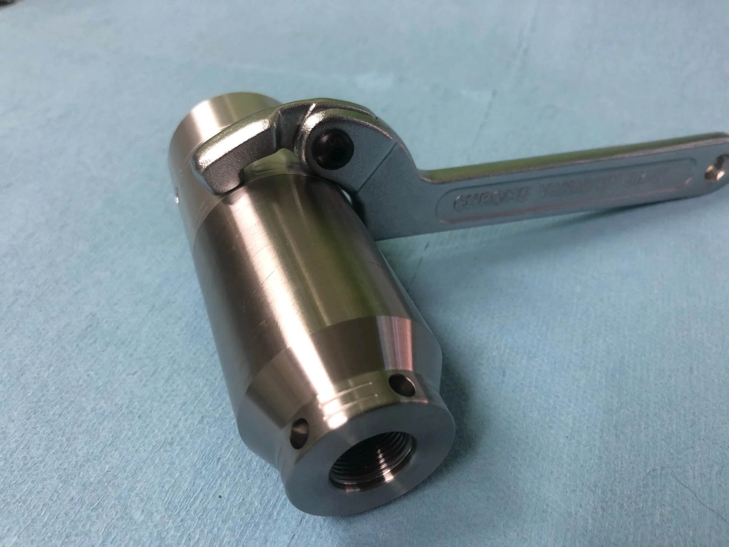 Proprietary tools are not required.  Pin punches or a #4 spanner (or two) is all that is needed.