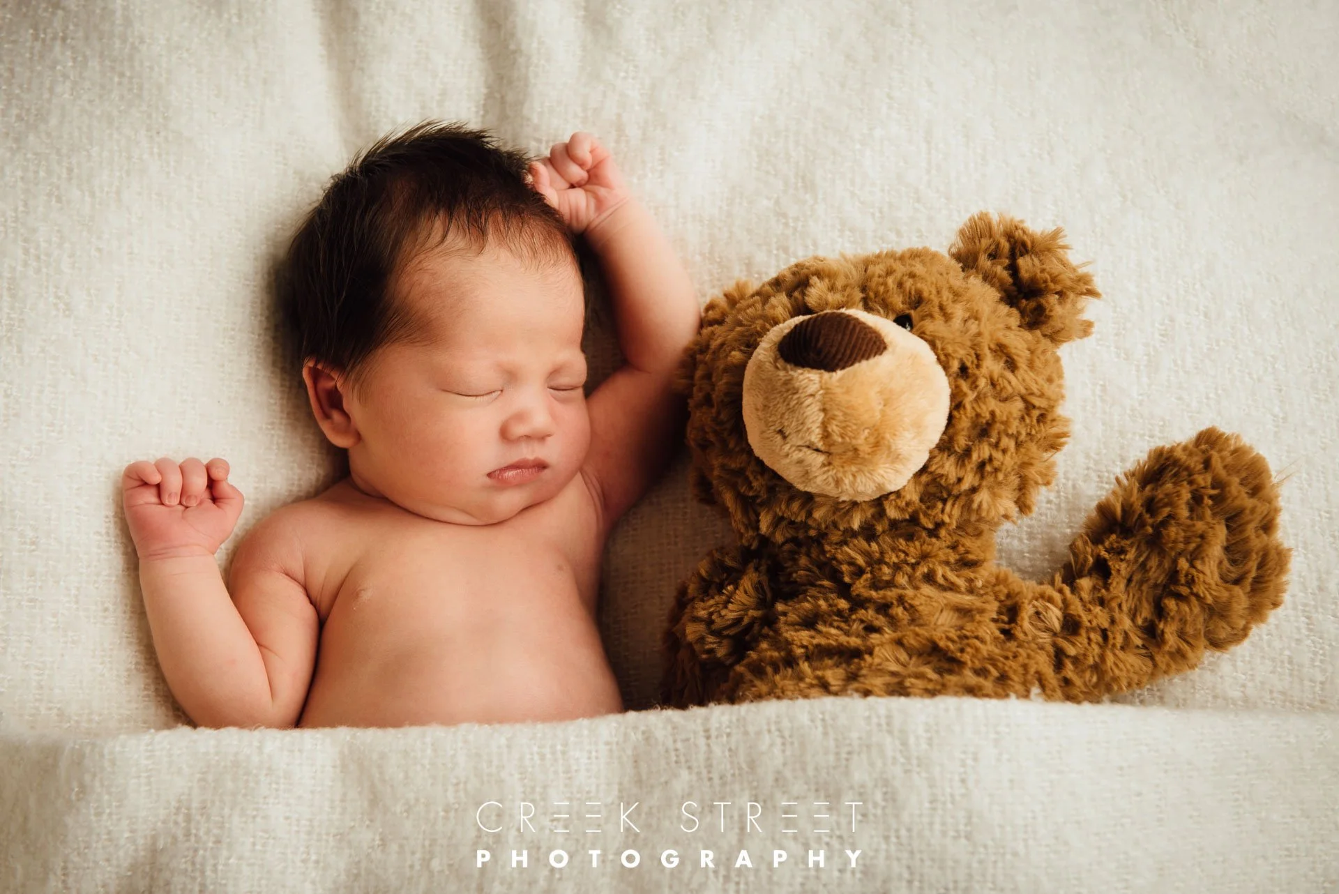 newborn with teddy bear.jpg