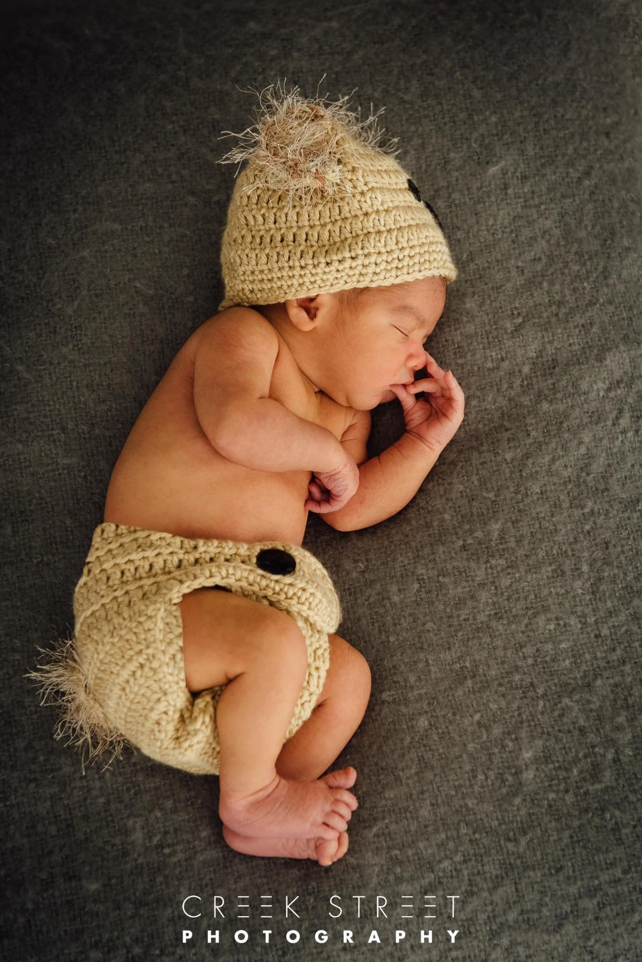 newborn with crotched beanie.jpg