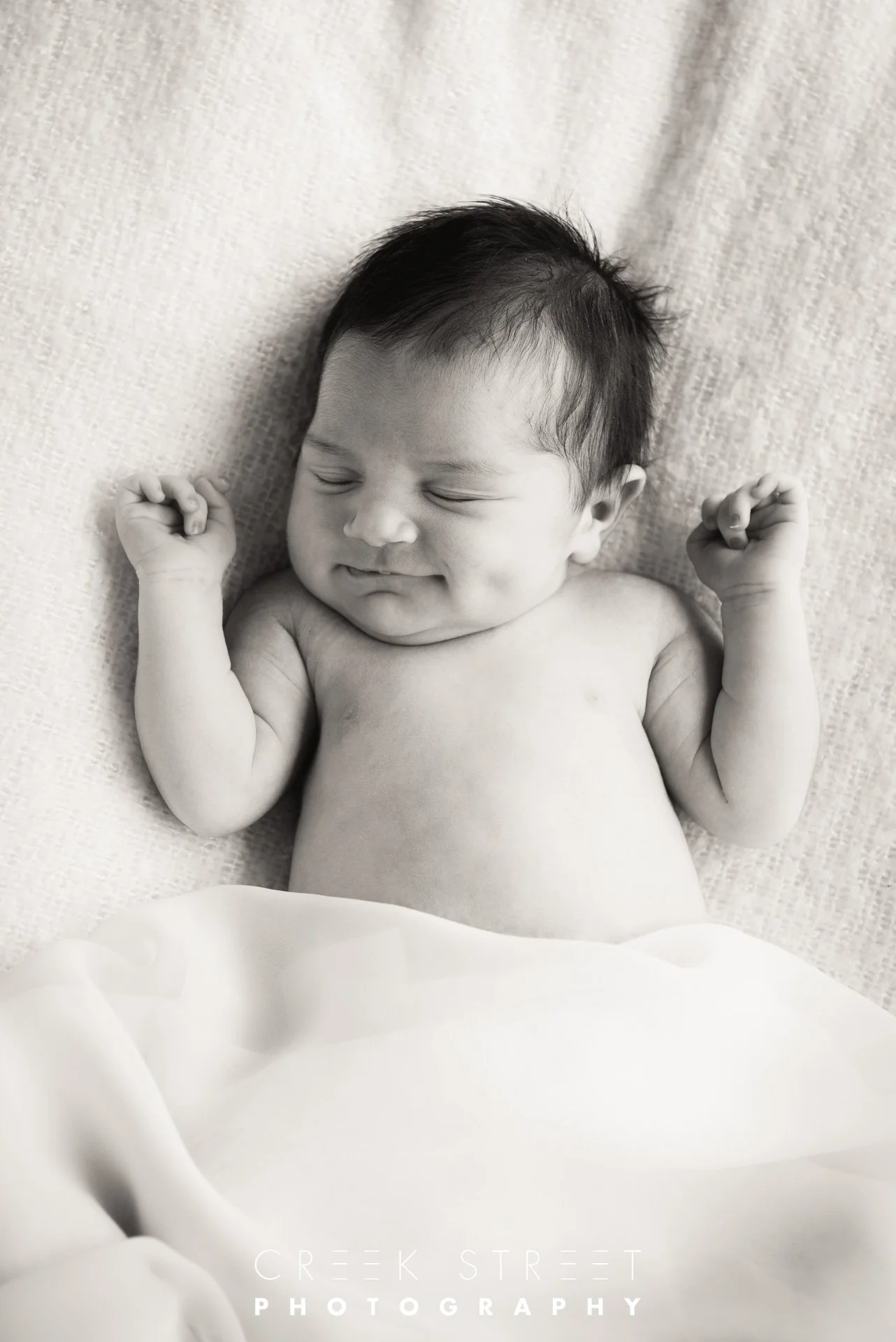 smiling newborn photography.jpg