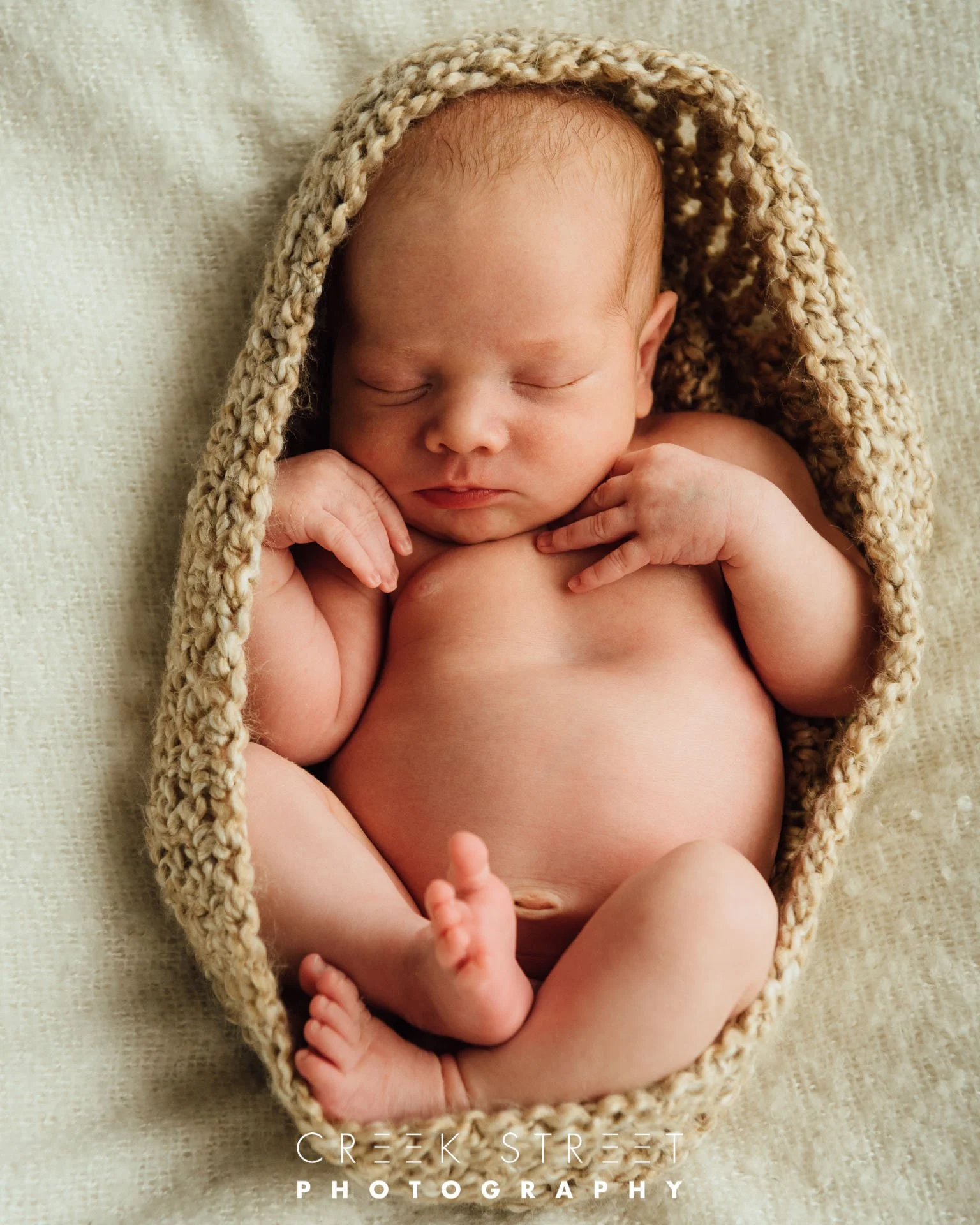 newborn portrait with prop.jpg