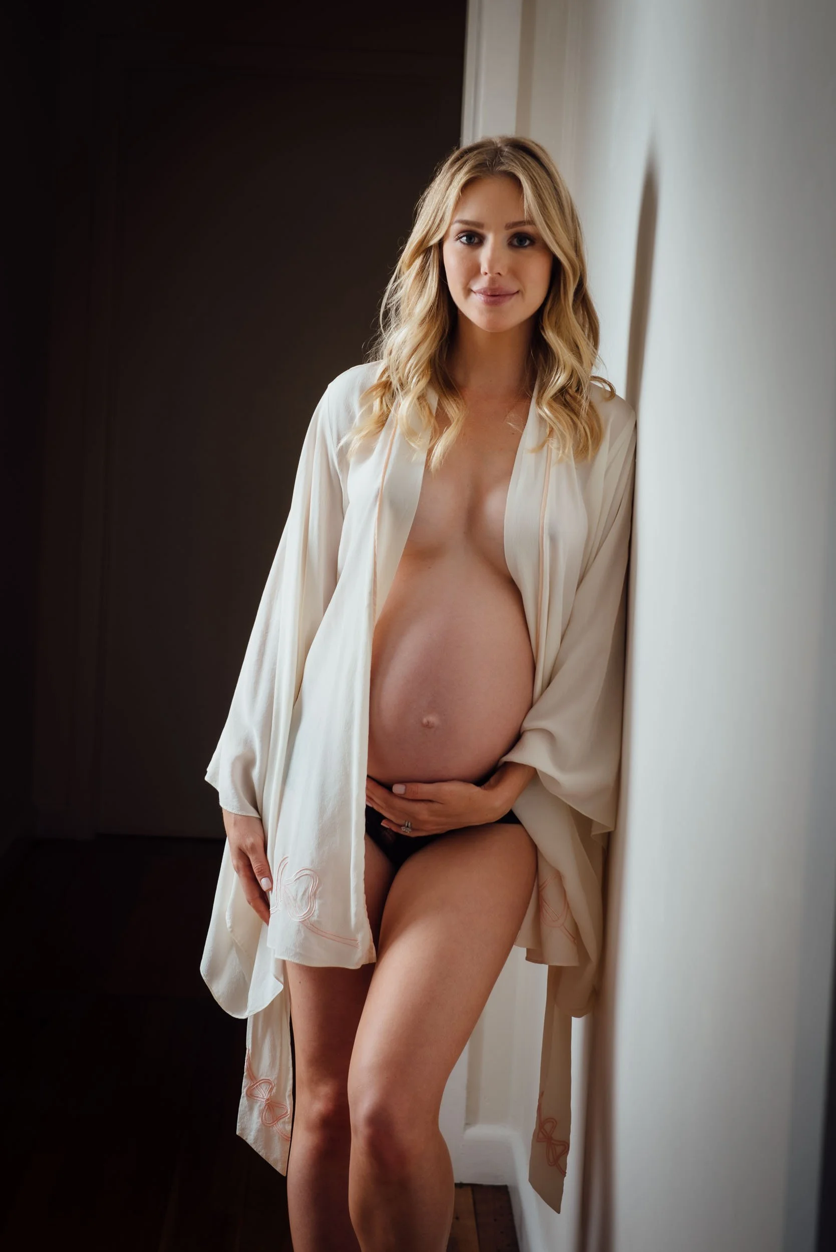 Sydney pregnancy photography studio shoot of a woman in a silk robe