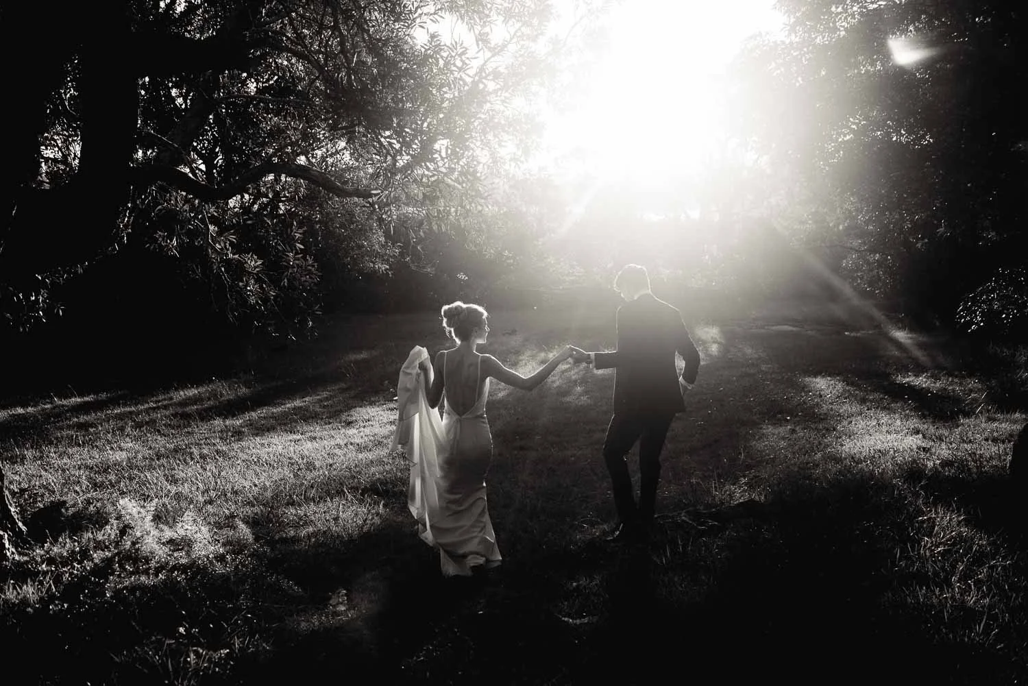 Wedding photo from Athol Hall Sydney – beautiful black-and-white photography of bride and groom at sunset
