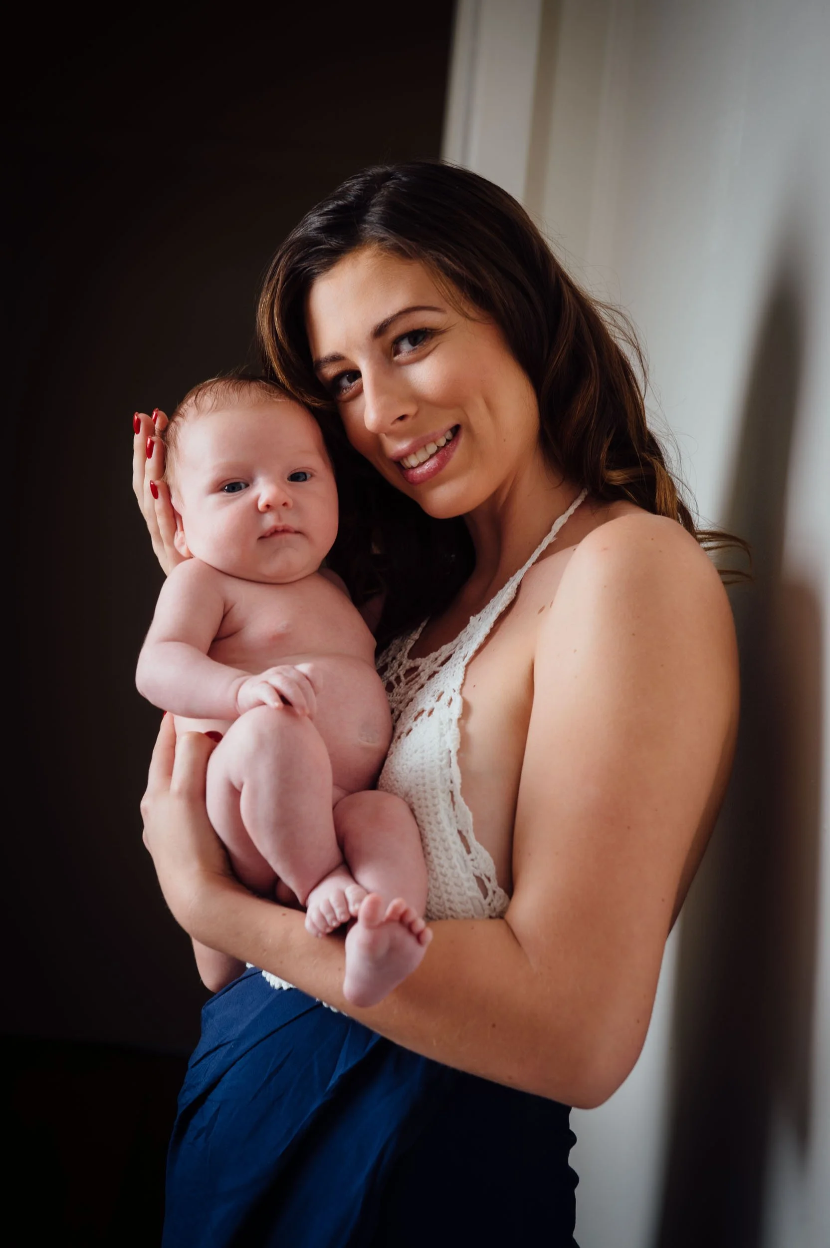 mother holding her 4 month old baby