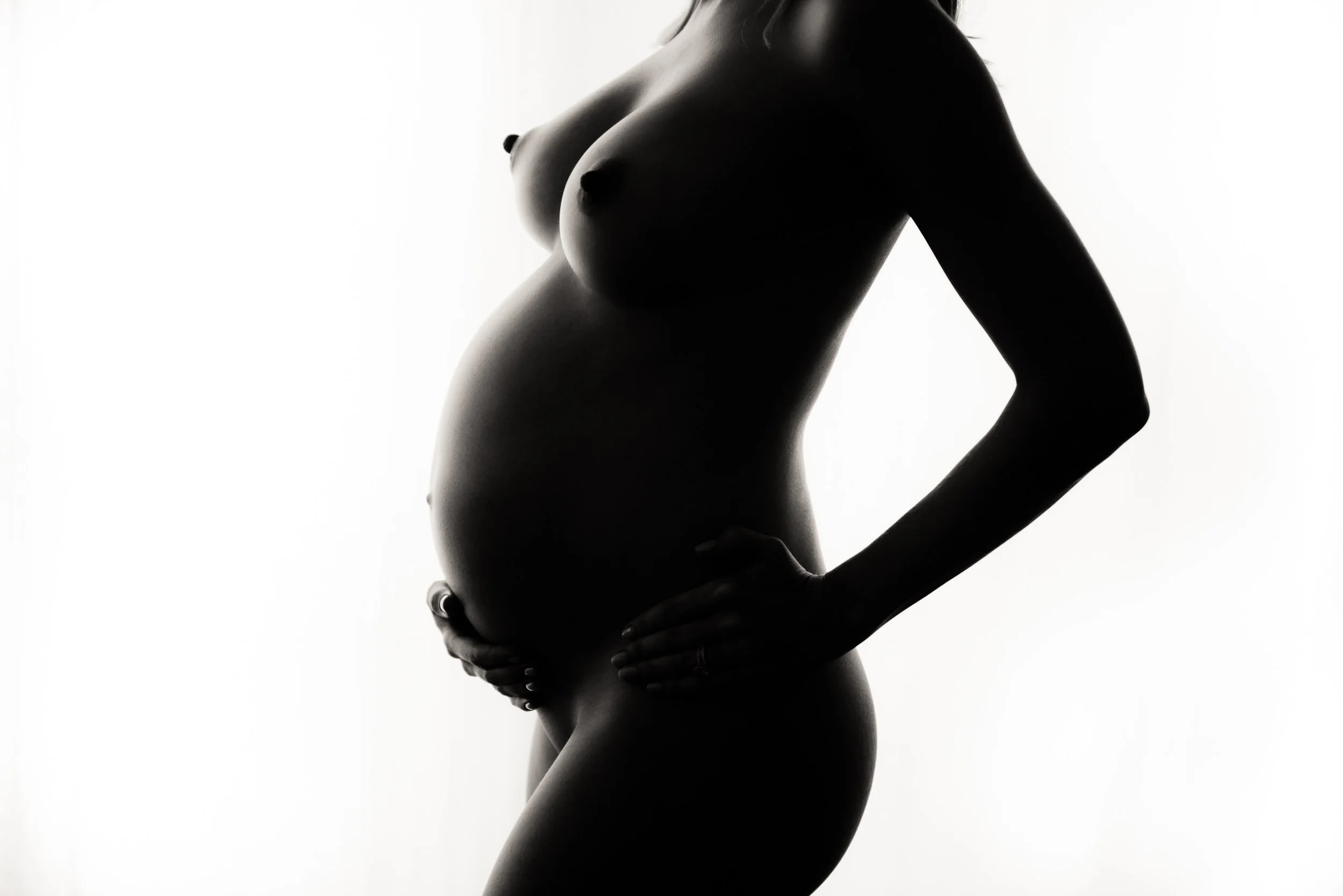 Pregnant photography silhouette of belly close-up