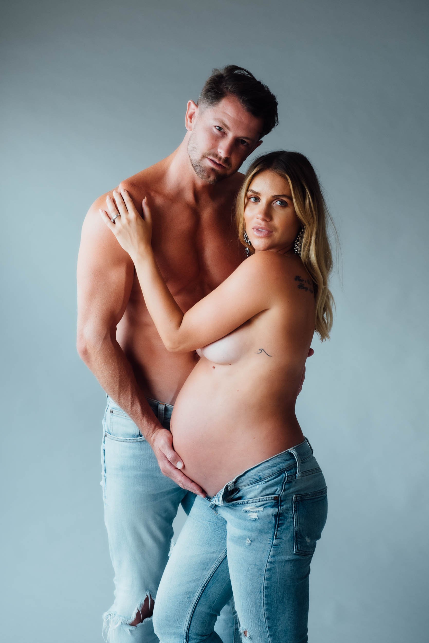 couple wearing jeans during a maternity photoshoot in Sydney