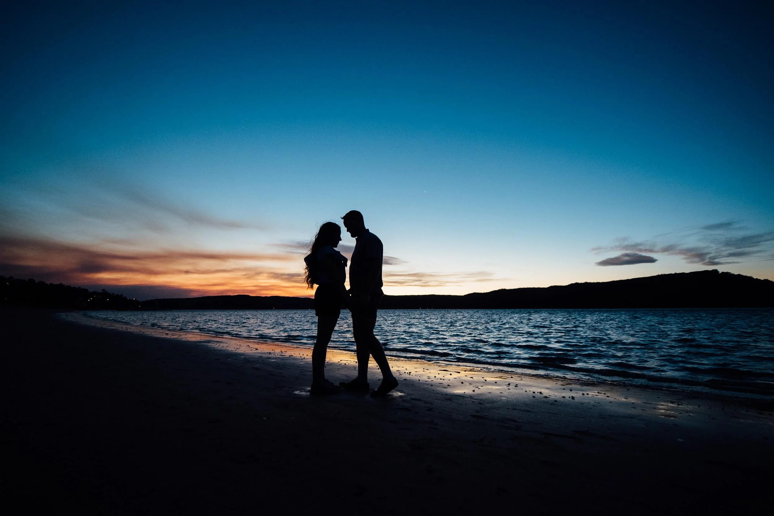 sunset beach photoshoot of couple in Sydney