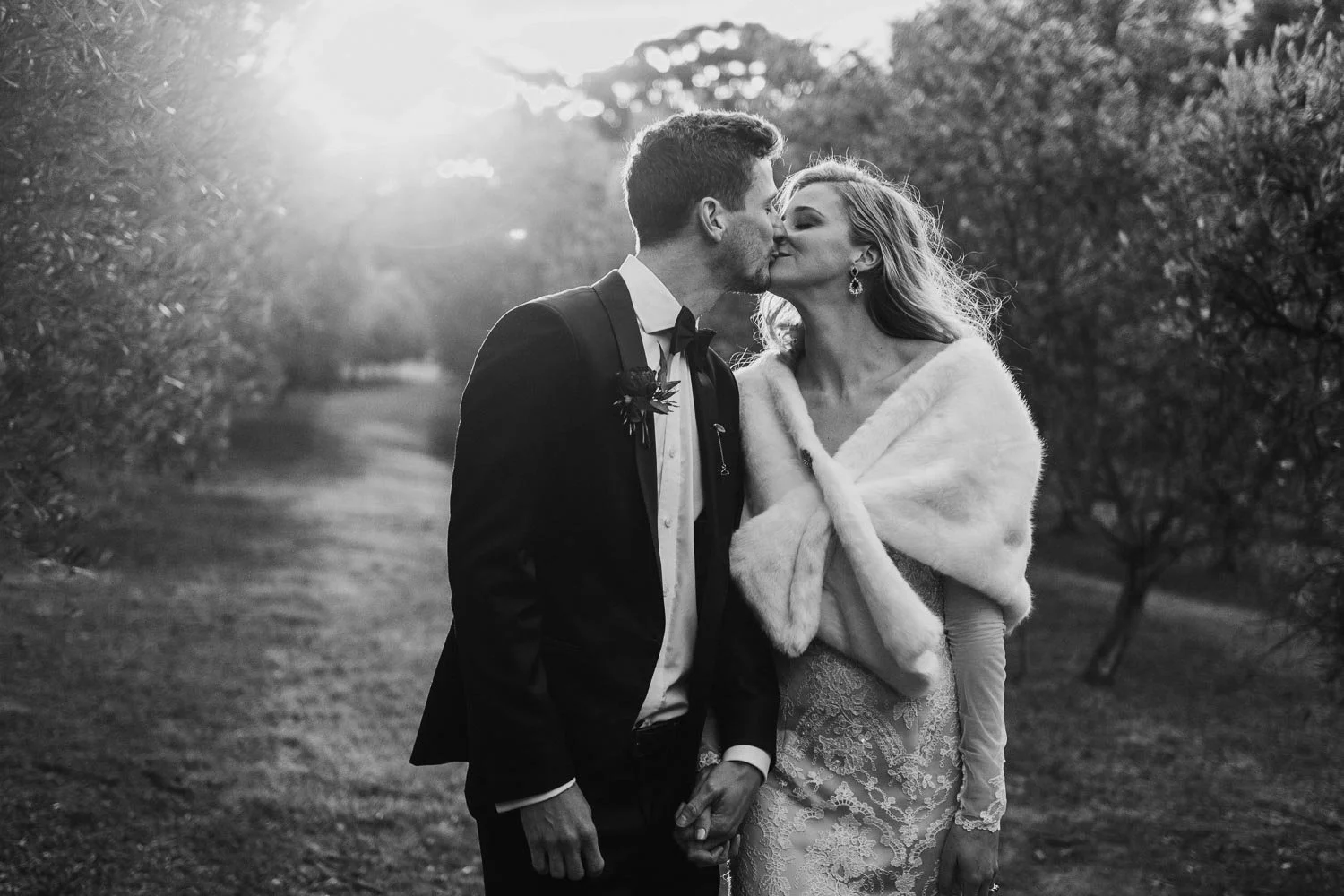 Wedding photo from Wandin estate, Hunter Valley, Wandin Estate Winery, bride and groom walking among the vines
