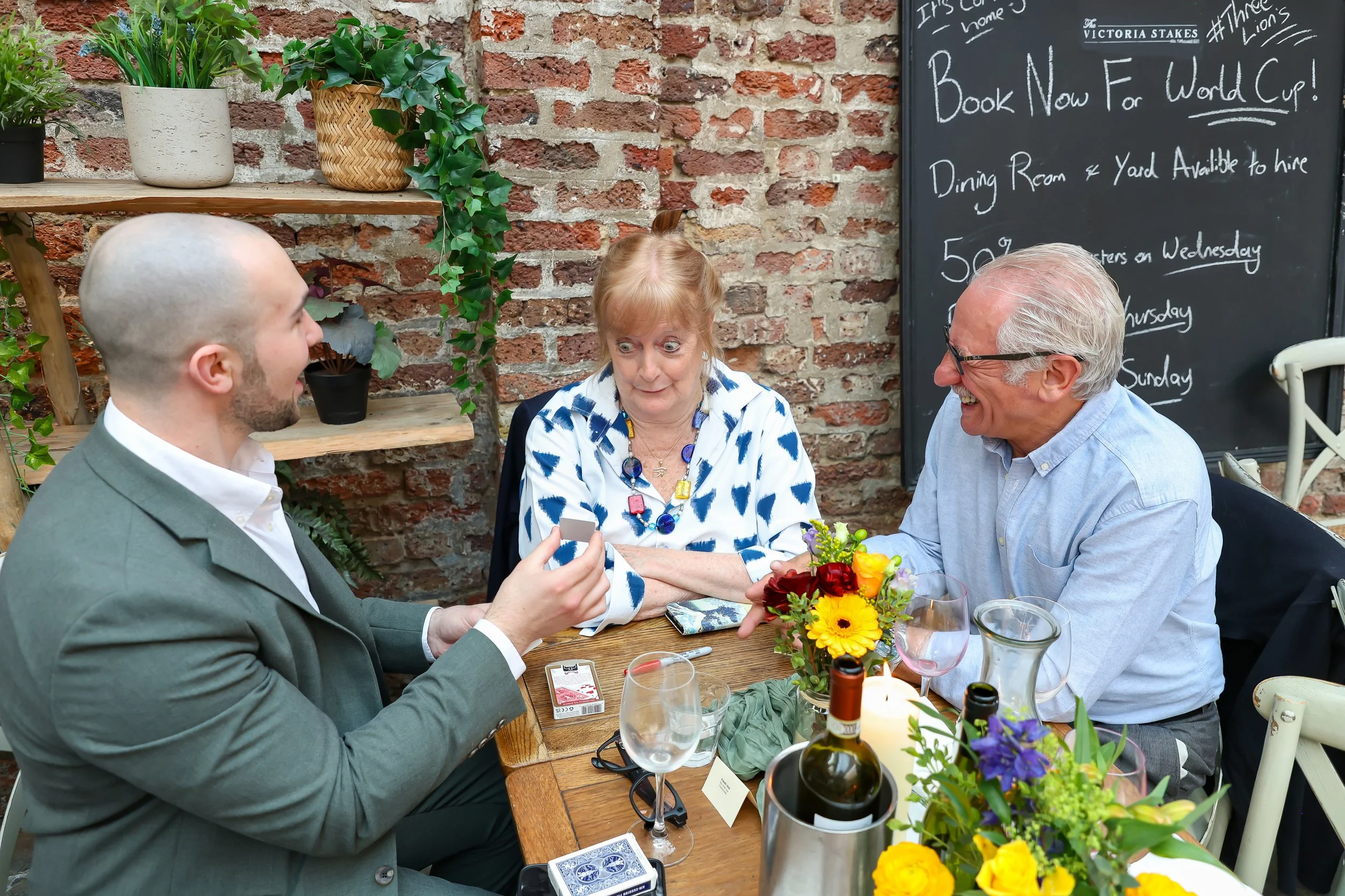 Guests love and enjoying to witness the close-up magic to happen. 2026-May 3 Rhoda & Baruch Golden Wedding Anniversary. 