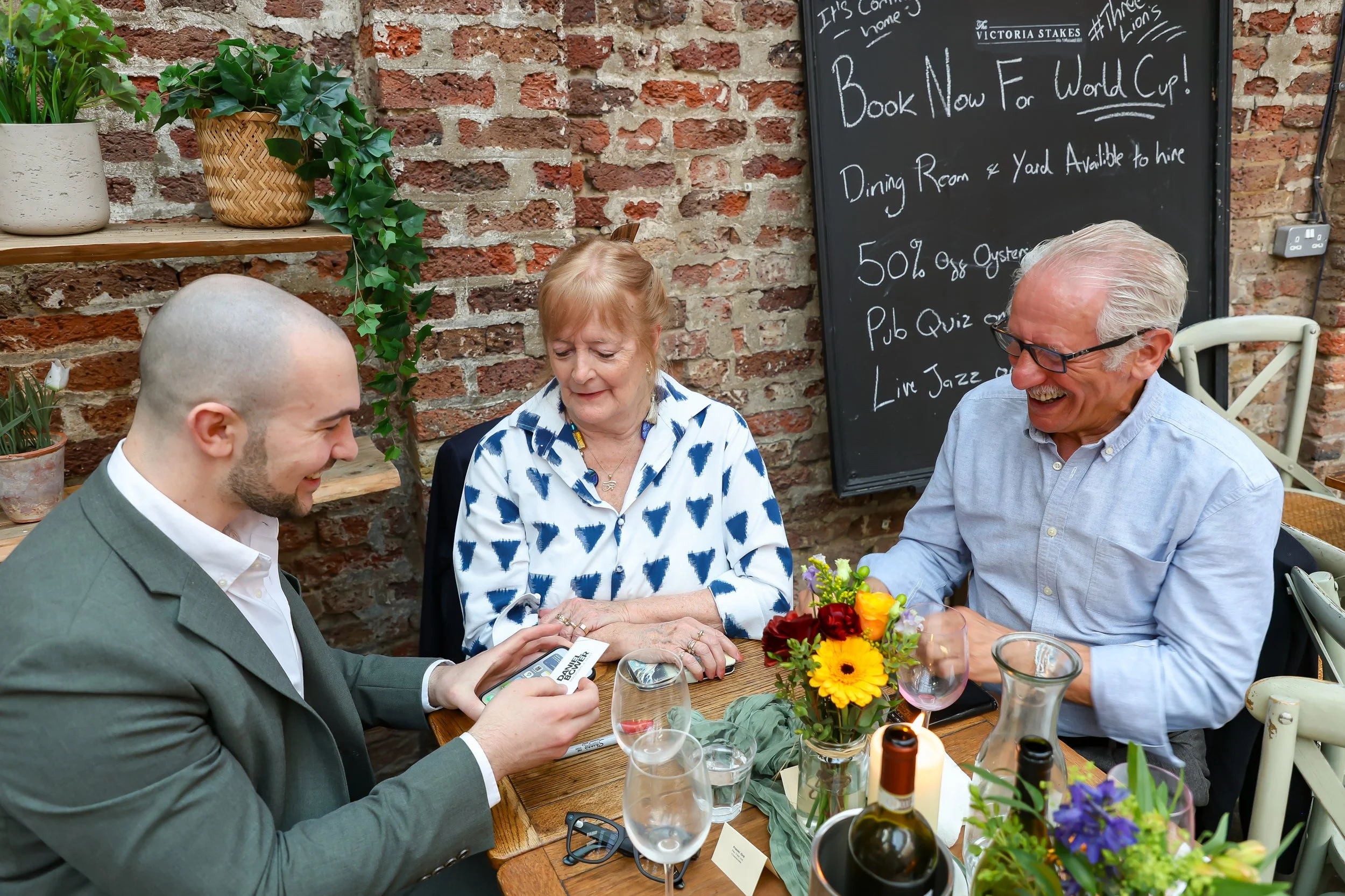 Guests love and enjoying to witness the close-up magic to happen. 2026-May 3 Rhoda & Baruch Golden Wedding Anniversary. 