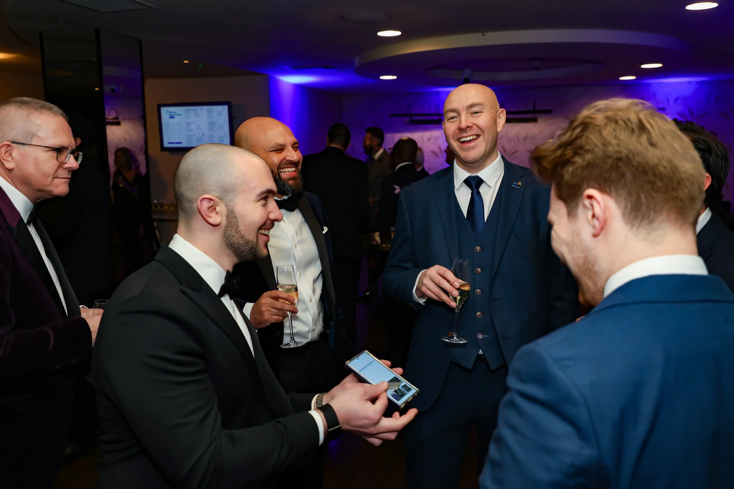 London Magician showed his trick using technology to the corporate guests. 