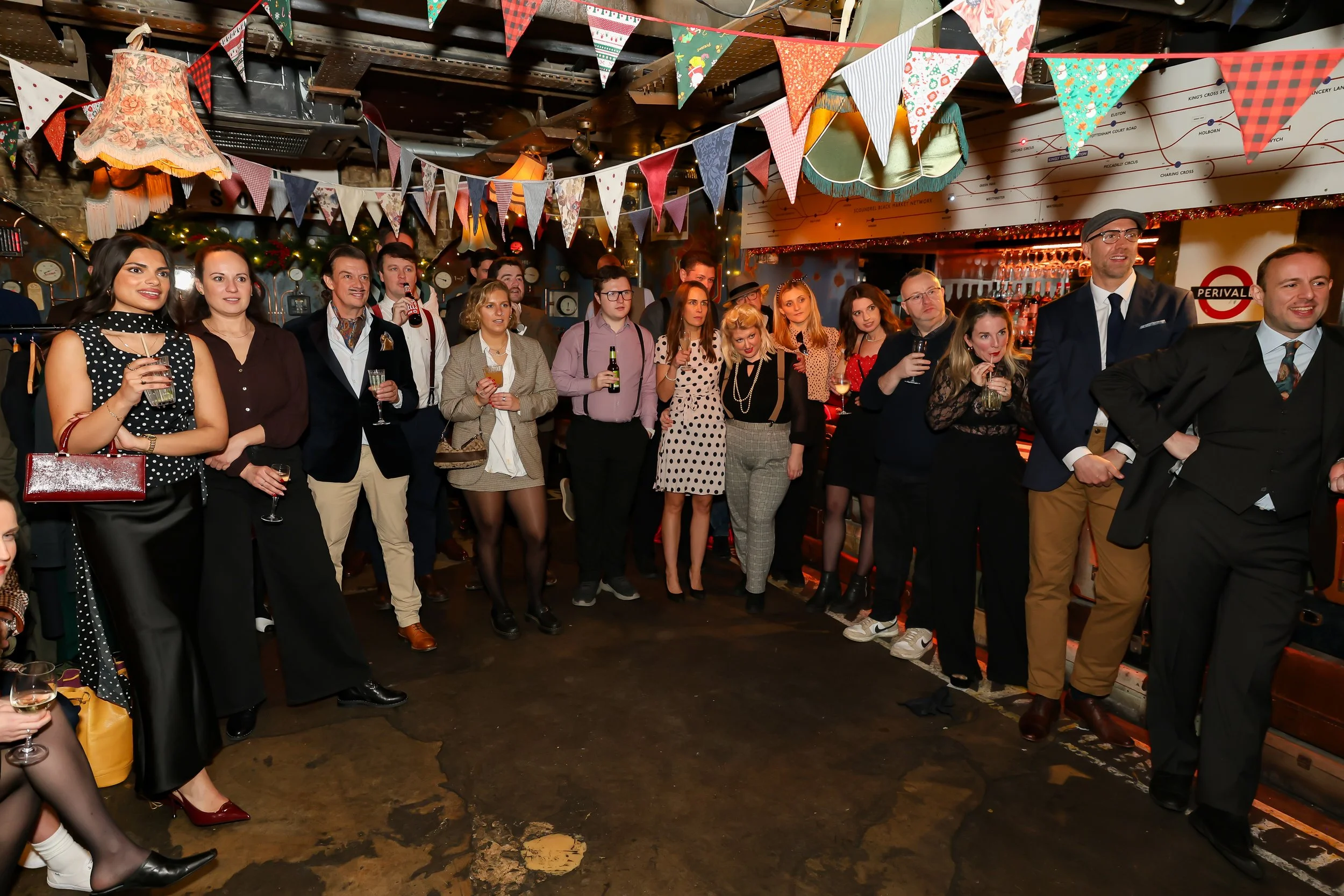 Magician performing walk-around magic for guests at reception.