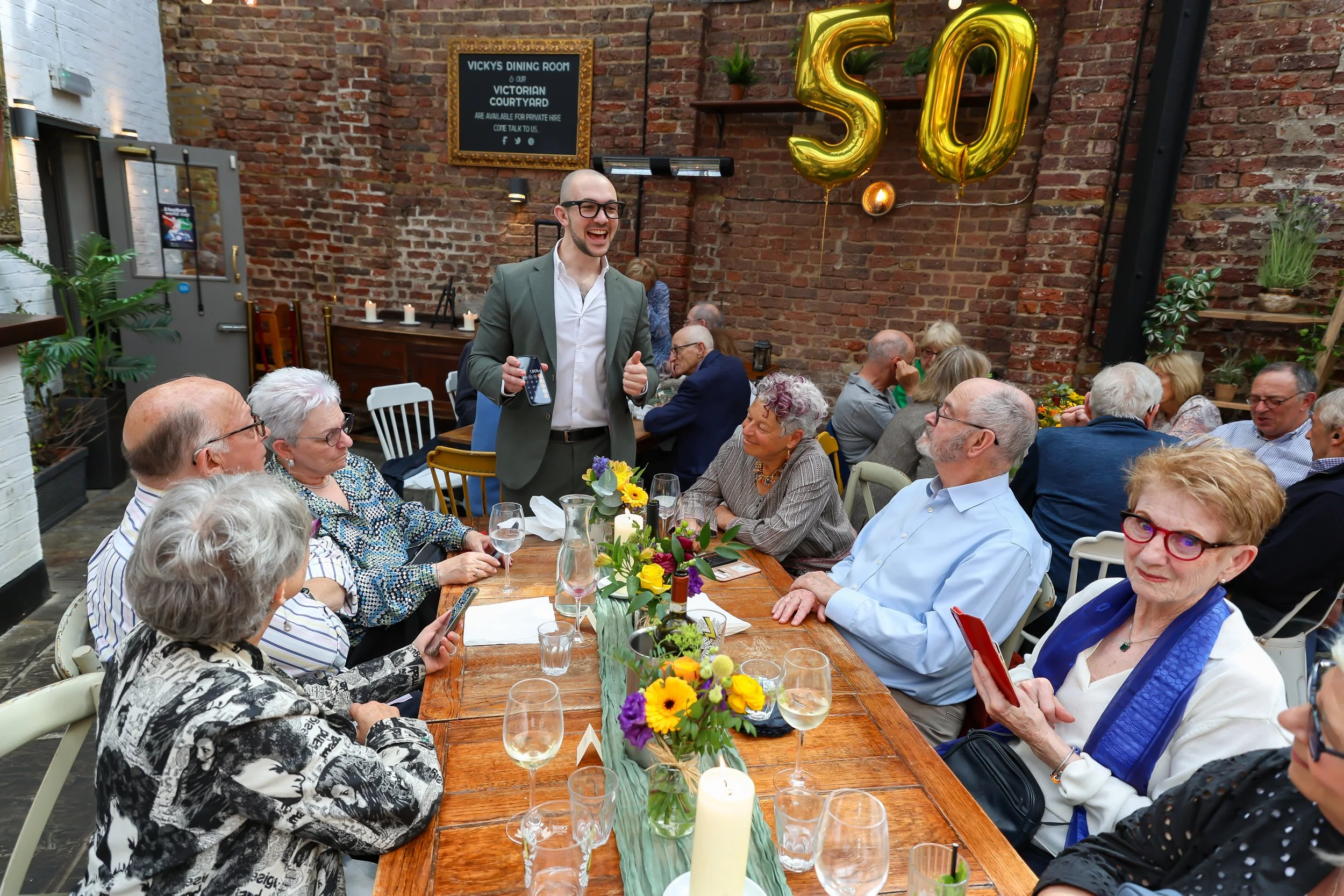 Magician loves roaming around and do his tricks with the guests. 2026-May 3 Rhoda & Baruch Golden Anniversary. 