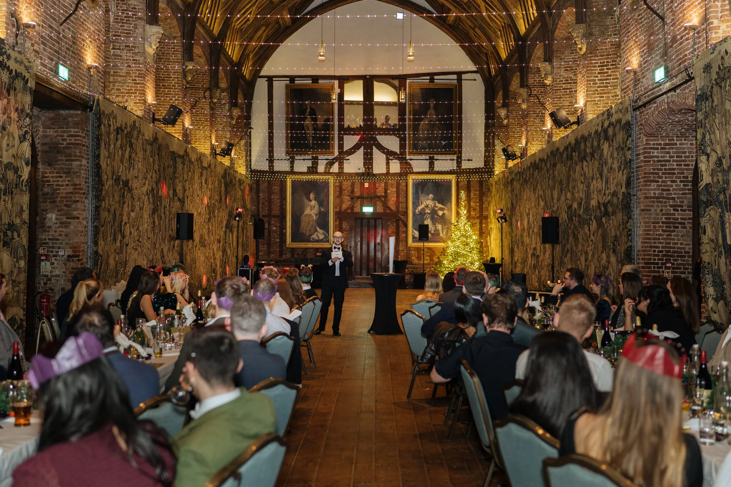 A professional event host maintaining flow, audience connection, and a polished experience throughout the event.