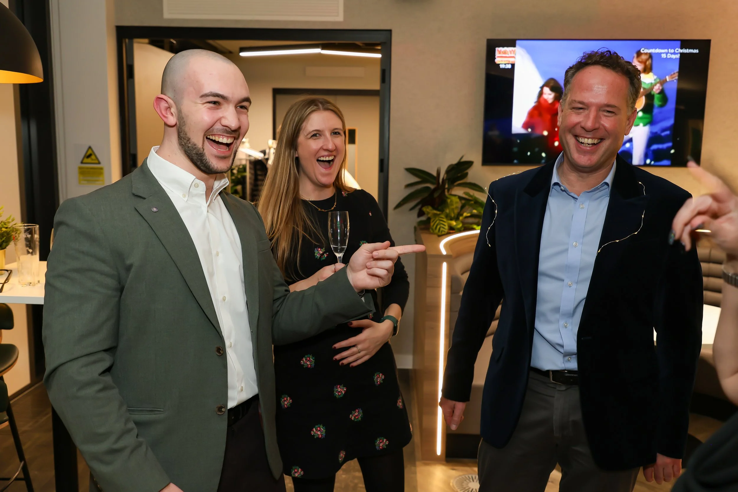 Close-up card magic leaves corporate guests amazed.