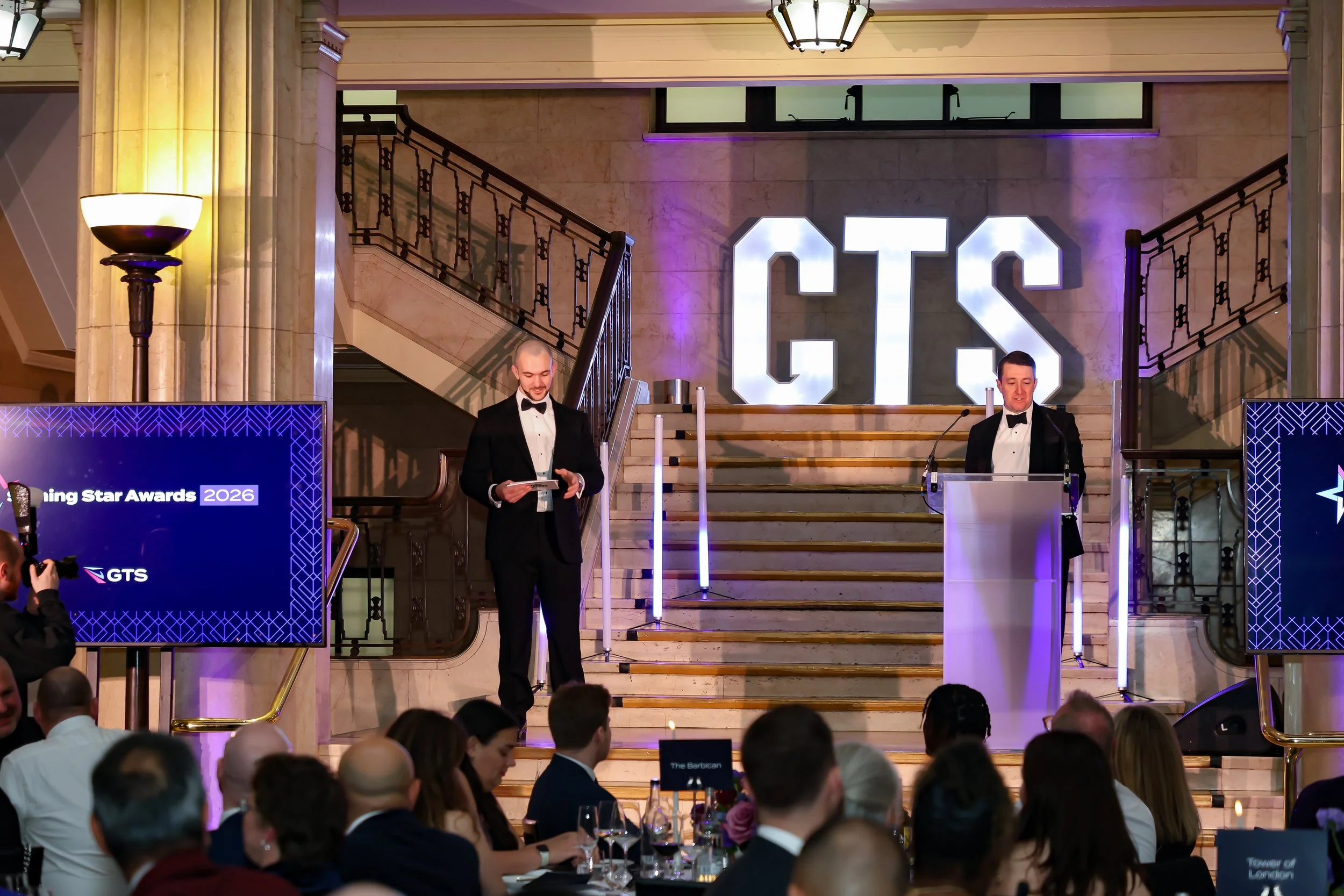 The Corporate representative giving speech to the audience. 