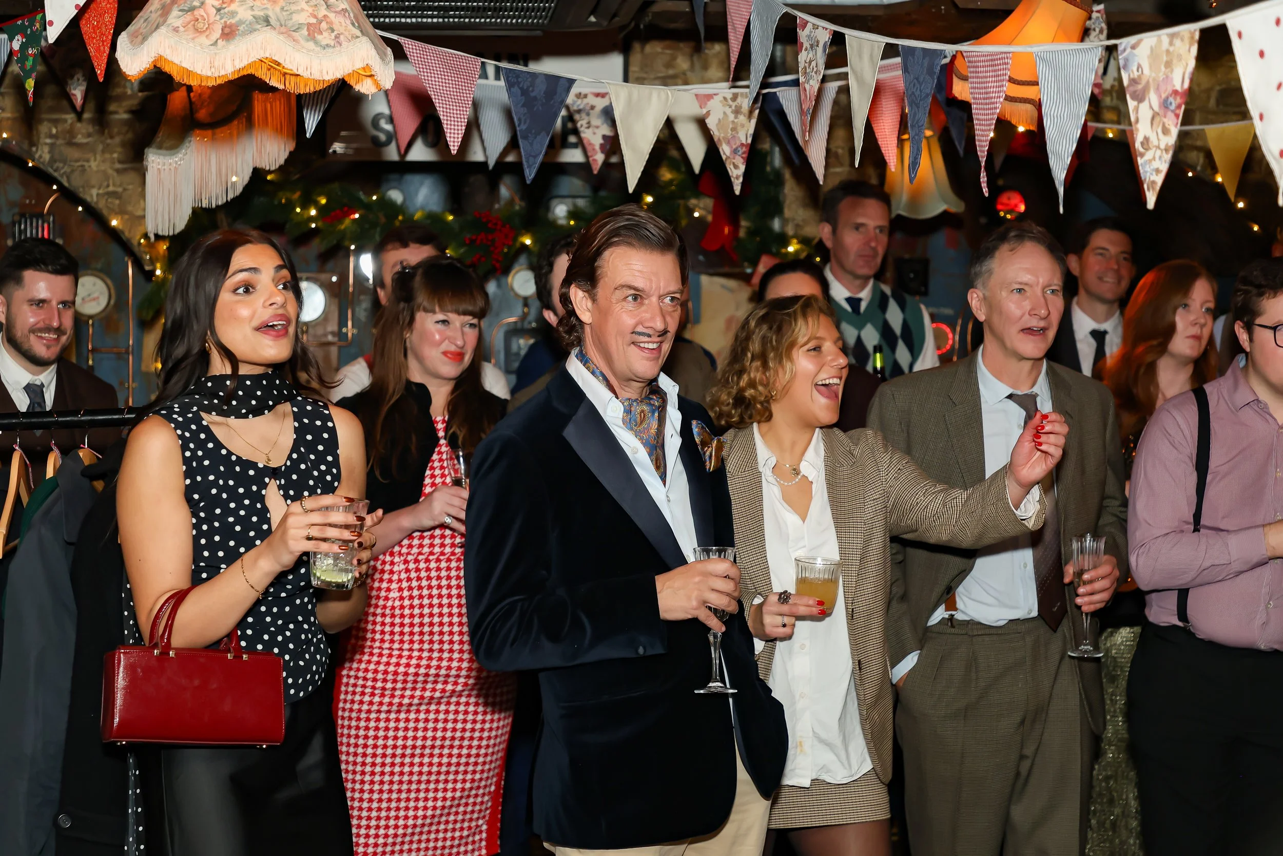 Magician entertaining guests with walk-around magic during reception
