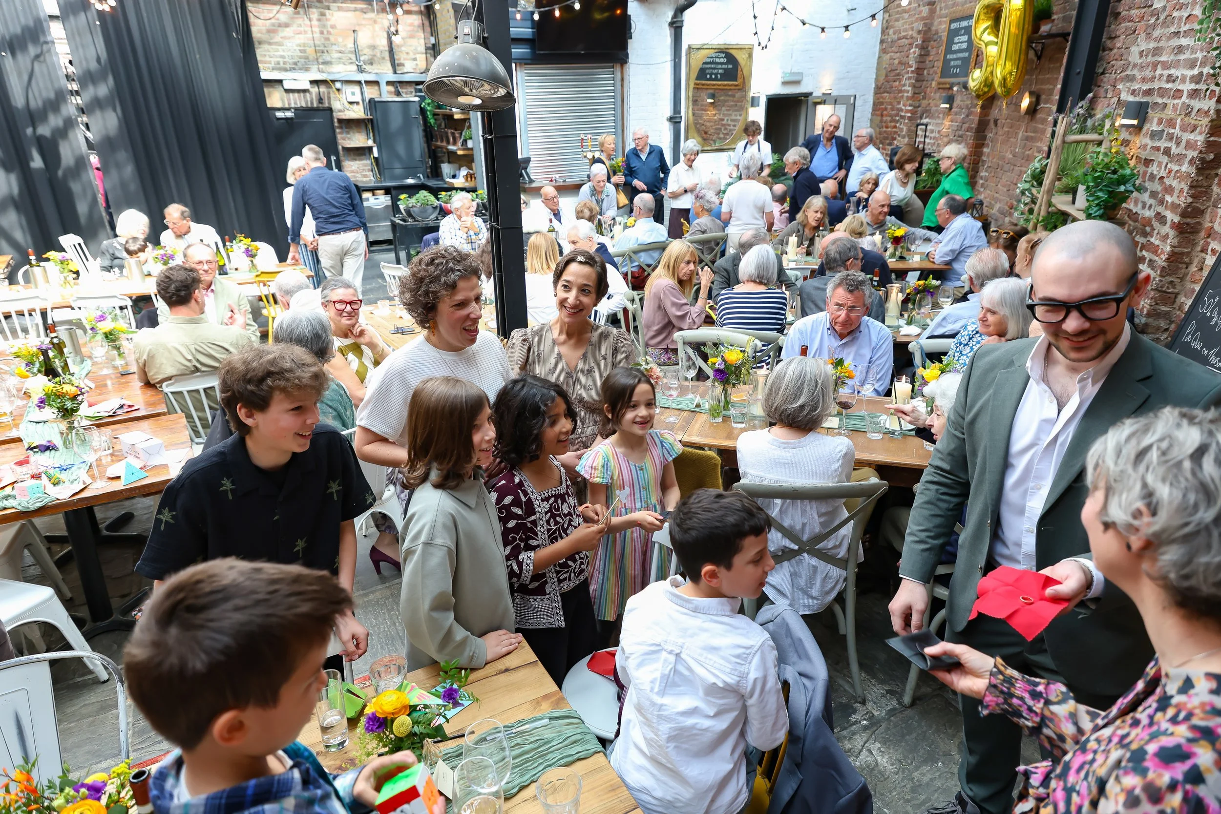 Magical moment with the amazing magician and kids. 2026-May 3 Rhoda & Baruch Golden Wedding Anniversary. 