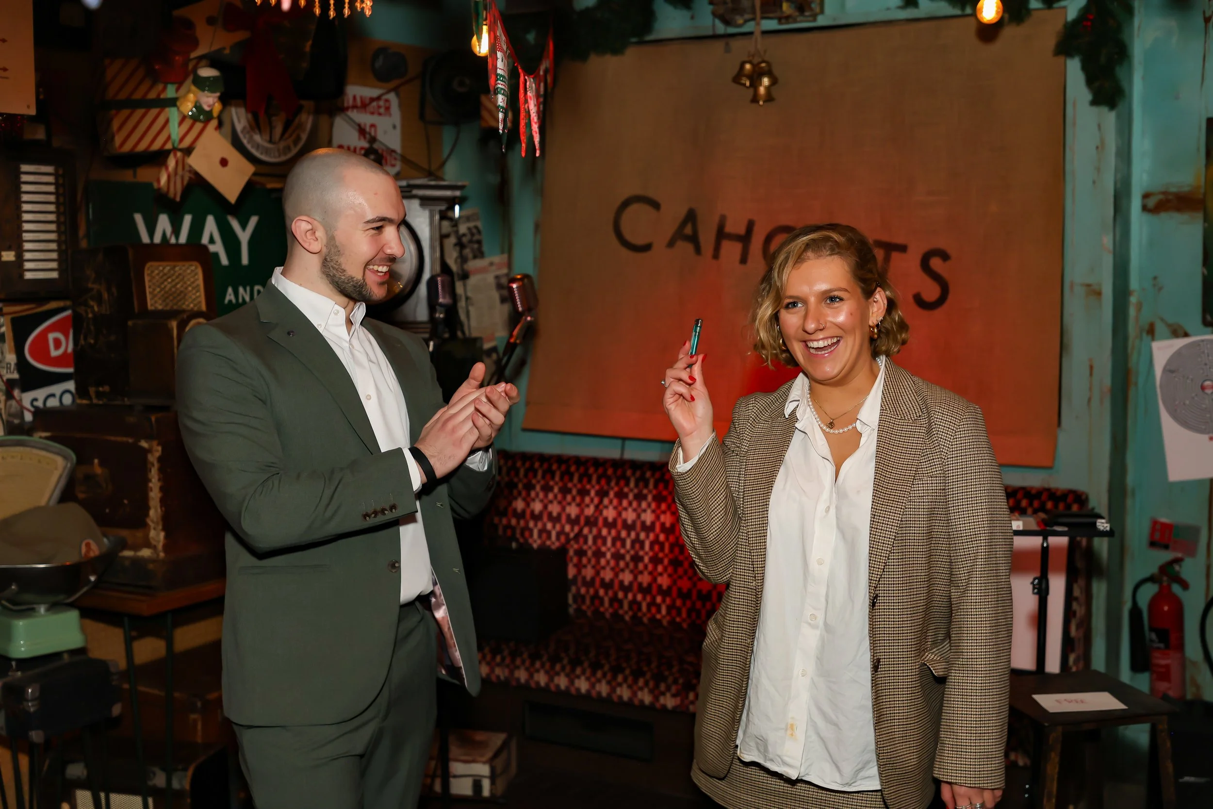 Interactive fire magic entertaining guest at a corporate reception.