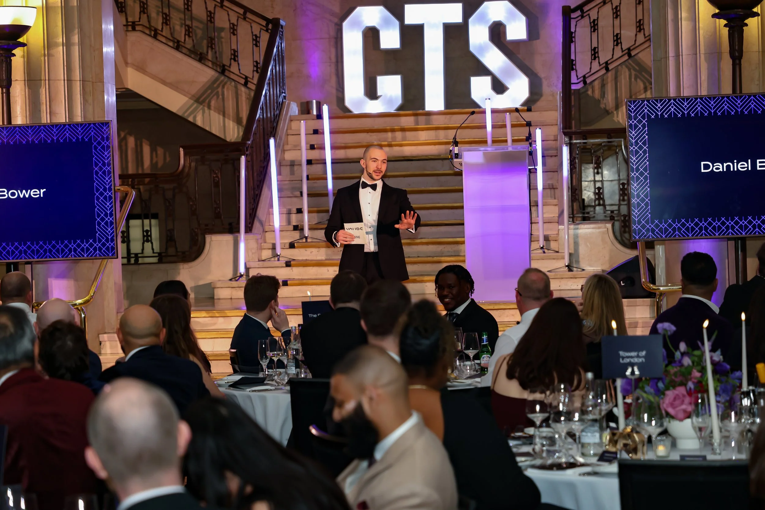 A skilled event host & magician balancing structure and spontaneity to keep the room energised and focused.