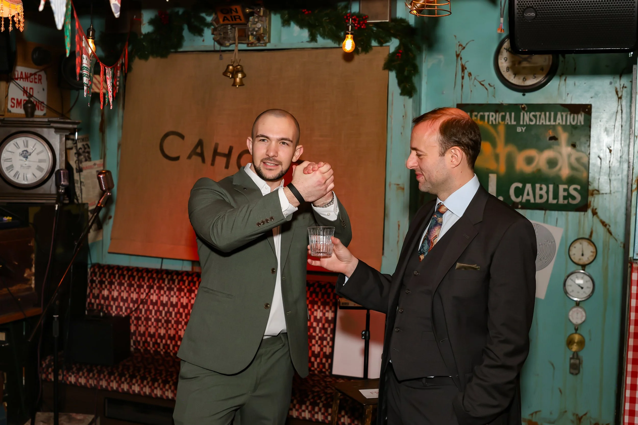 Corporate guests participating in a dramatic ice magic performance at the reception.