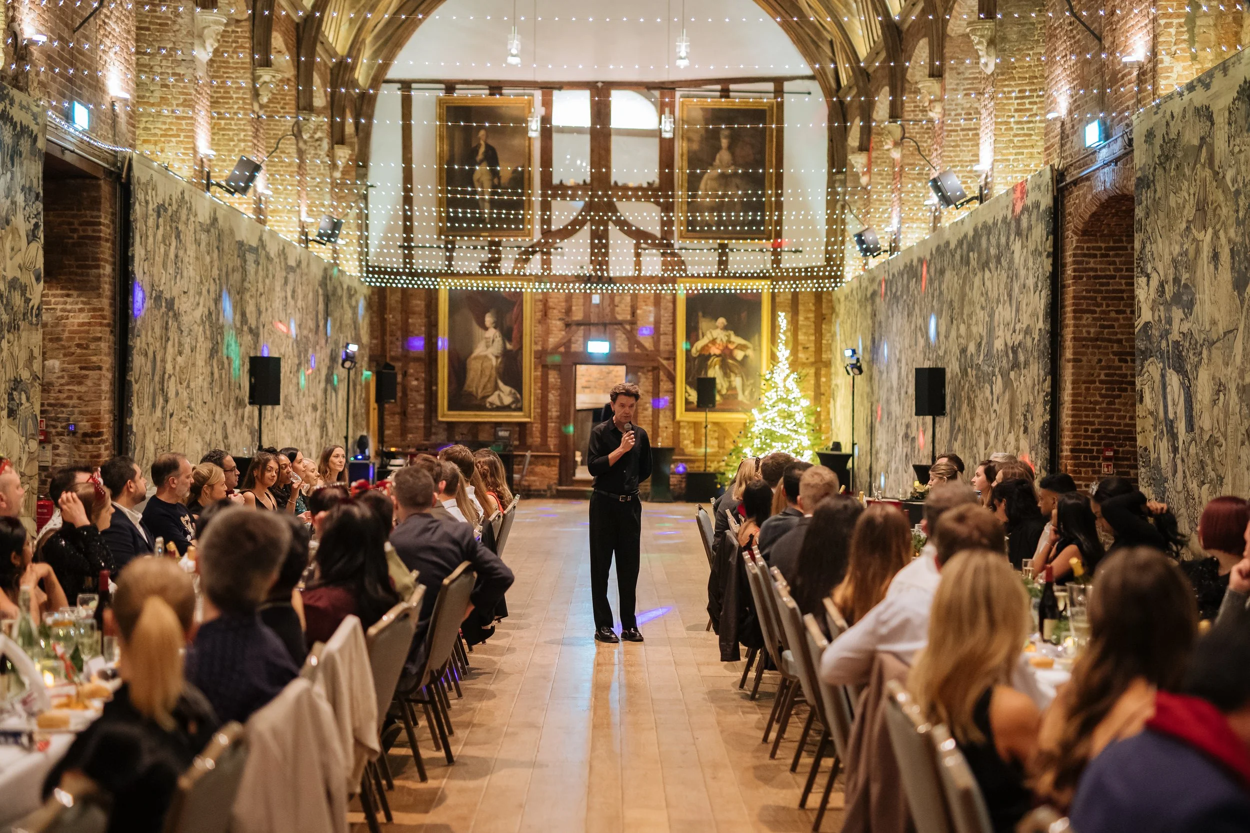 Business professionals attending a formal corporate dinner.