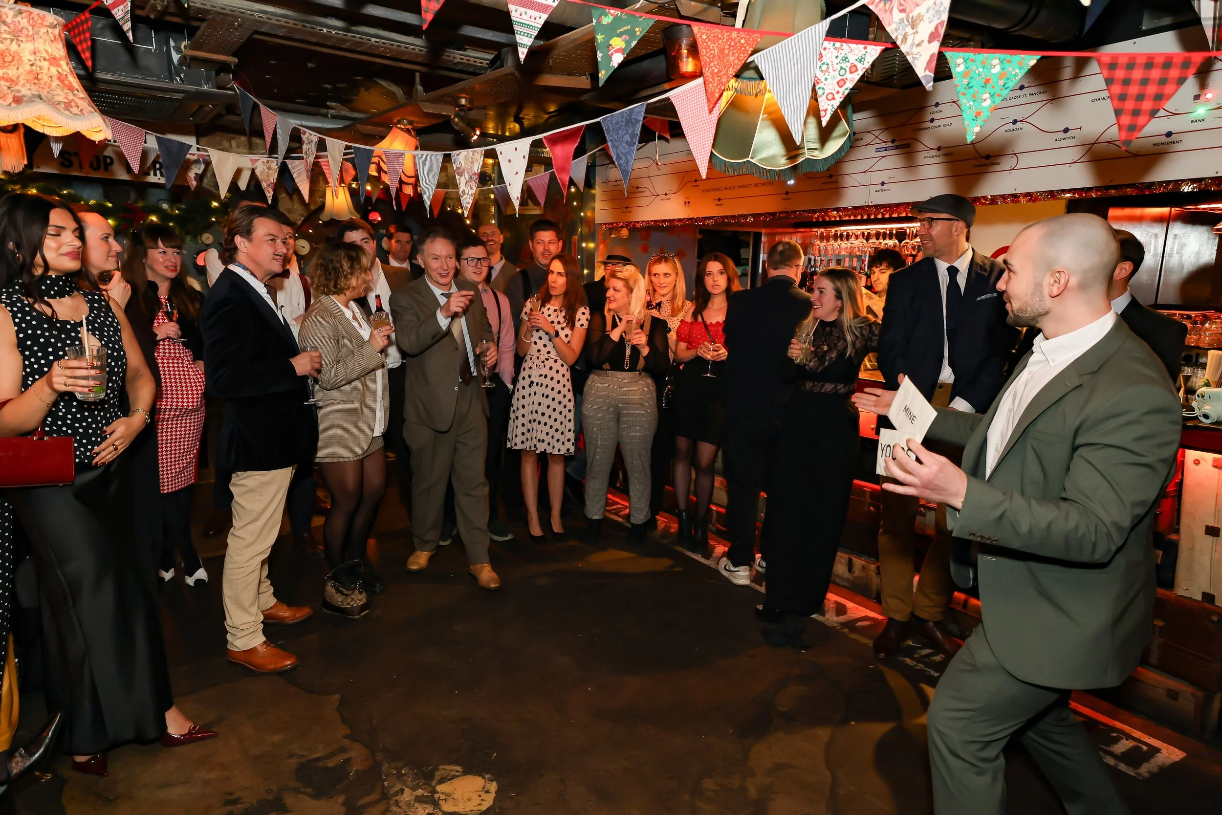 London Magician performing walk-around magic for guests at reception.