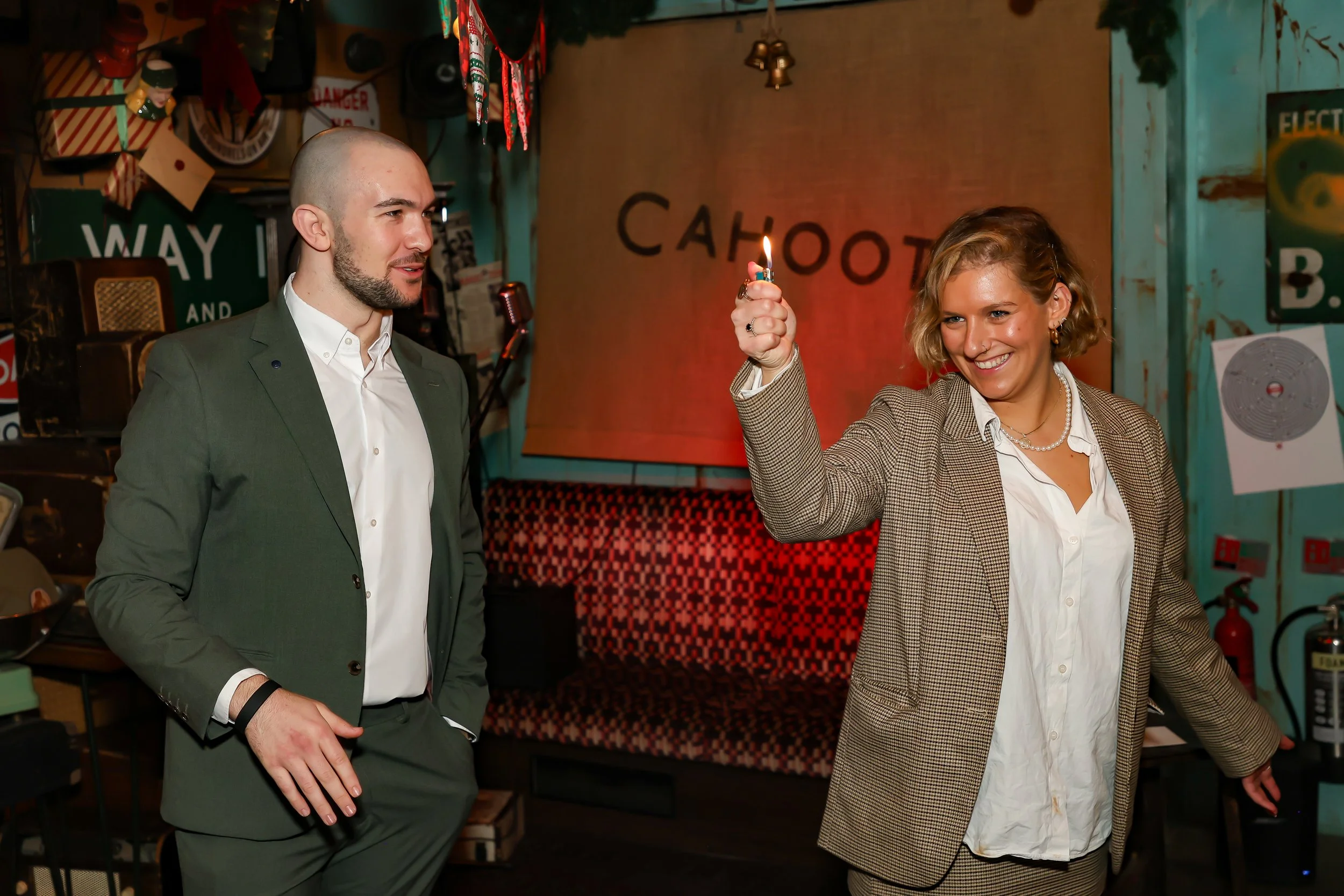 Interactive fire magic entertaining guest at a corporate reception.