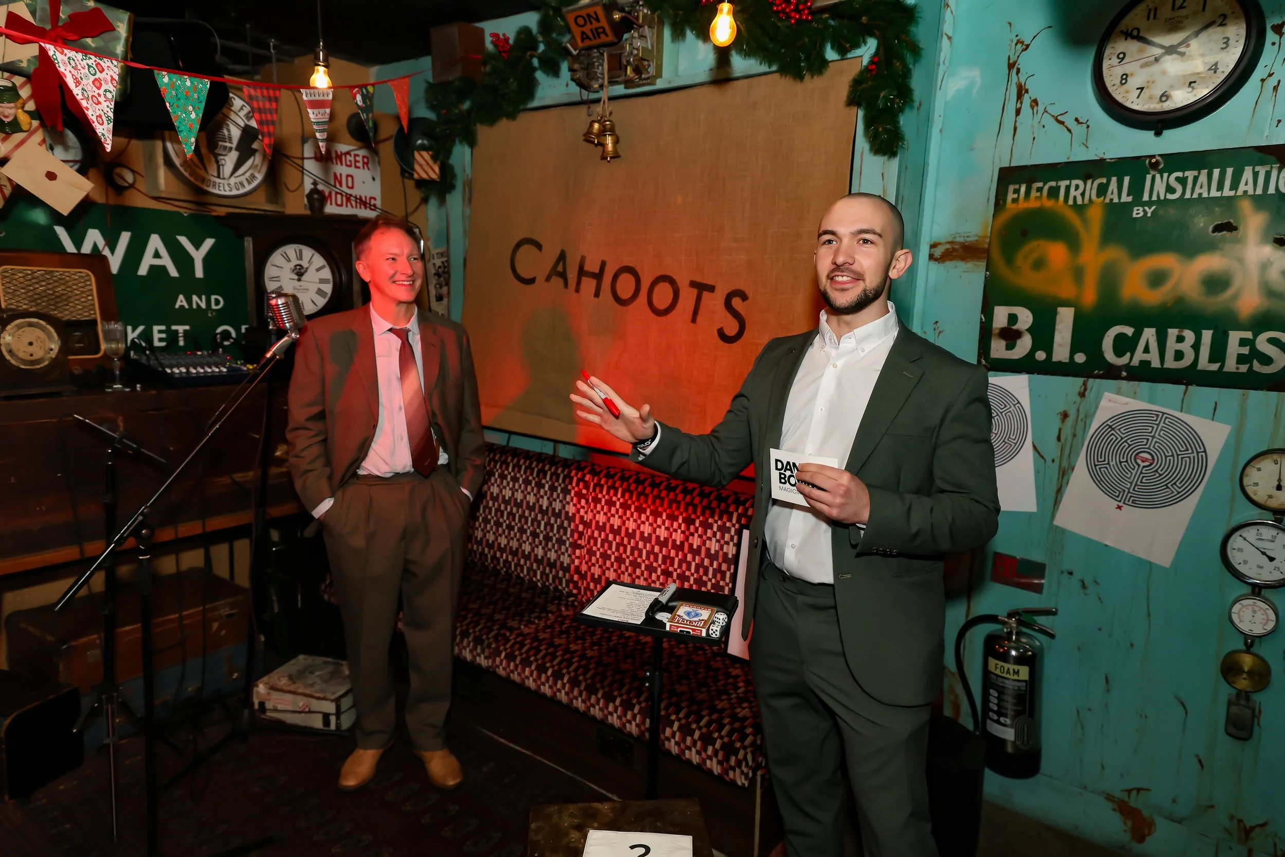 Interactive walk-around magic during corporate event reception.